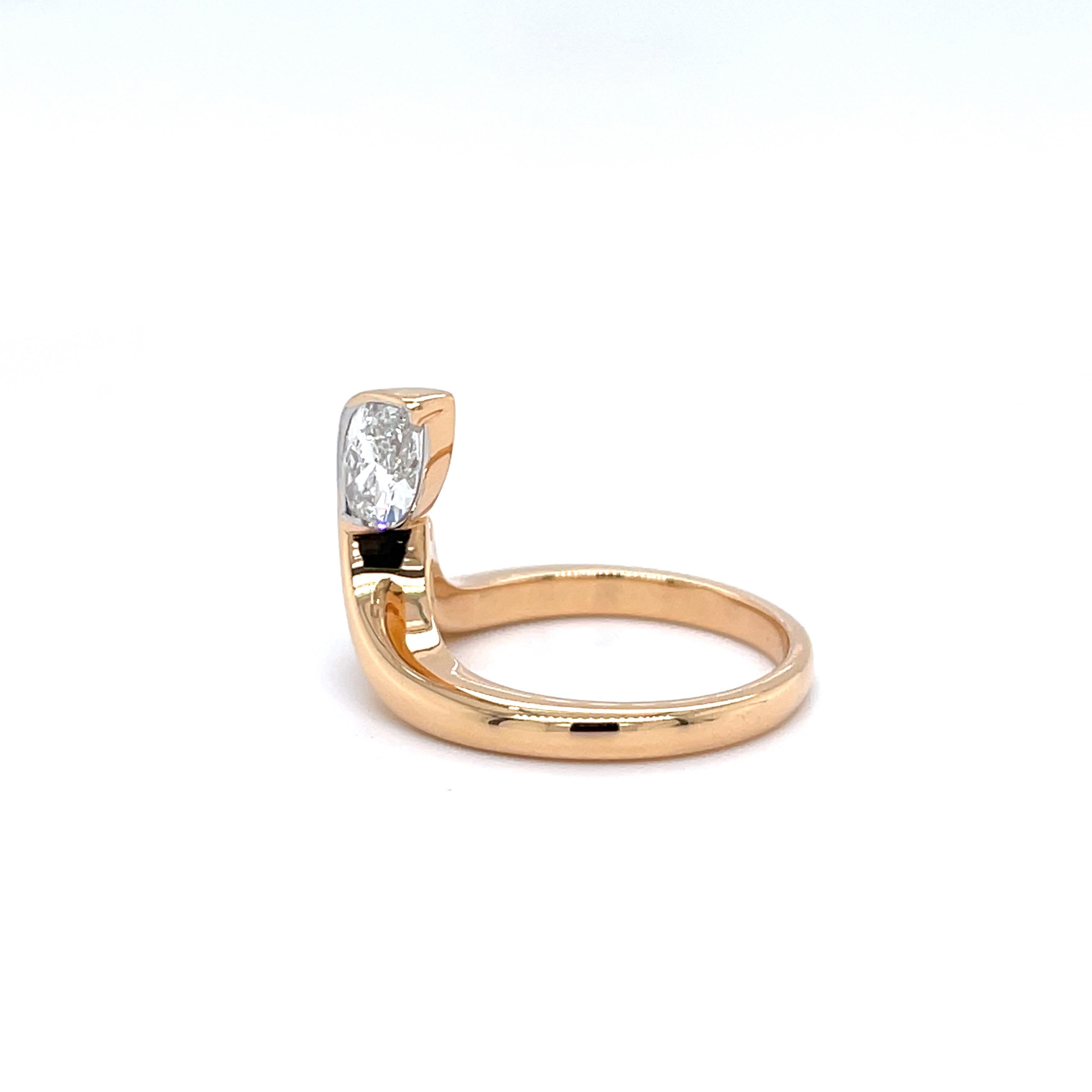 Elongated Elegance: GIA Certified Marquise Diamond Ring (0.90ct) in 18K Rose Gold

Embrace timeless design with a touch of modern flair with this captivating marquise diamond ring.  The center stone is a mesmerizing 0.90 carat marquise diamond,