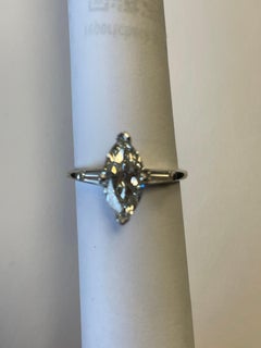 GIA Certified Marquise Shape Diamond in 14 Karat White Gold Baguette Mounting
