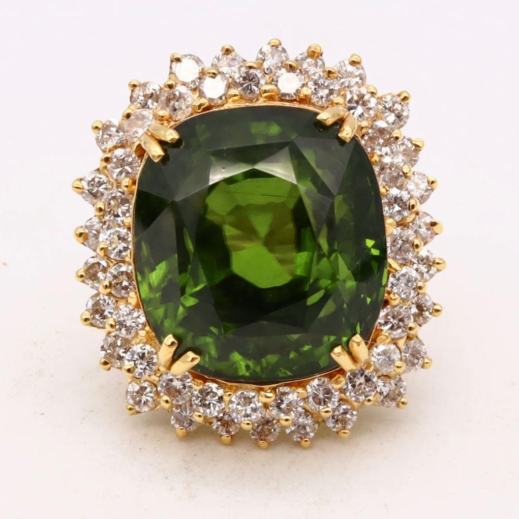 Important cocktail ring with Peridot gemstone.

Gorgeous and impressive piece, featuring a rare Peridot gemstone. This oversized ring was carefully crafted in solid 18 karats of polished yellow gold. 

Mounted on top with a cushion step cut (21,98 x