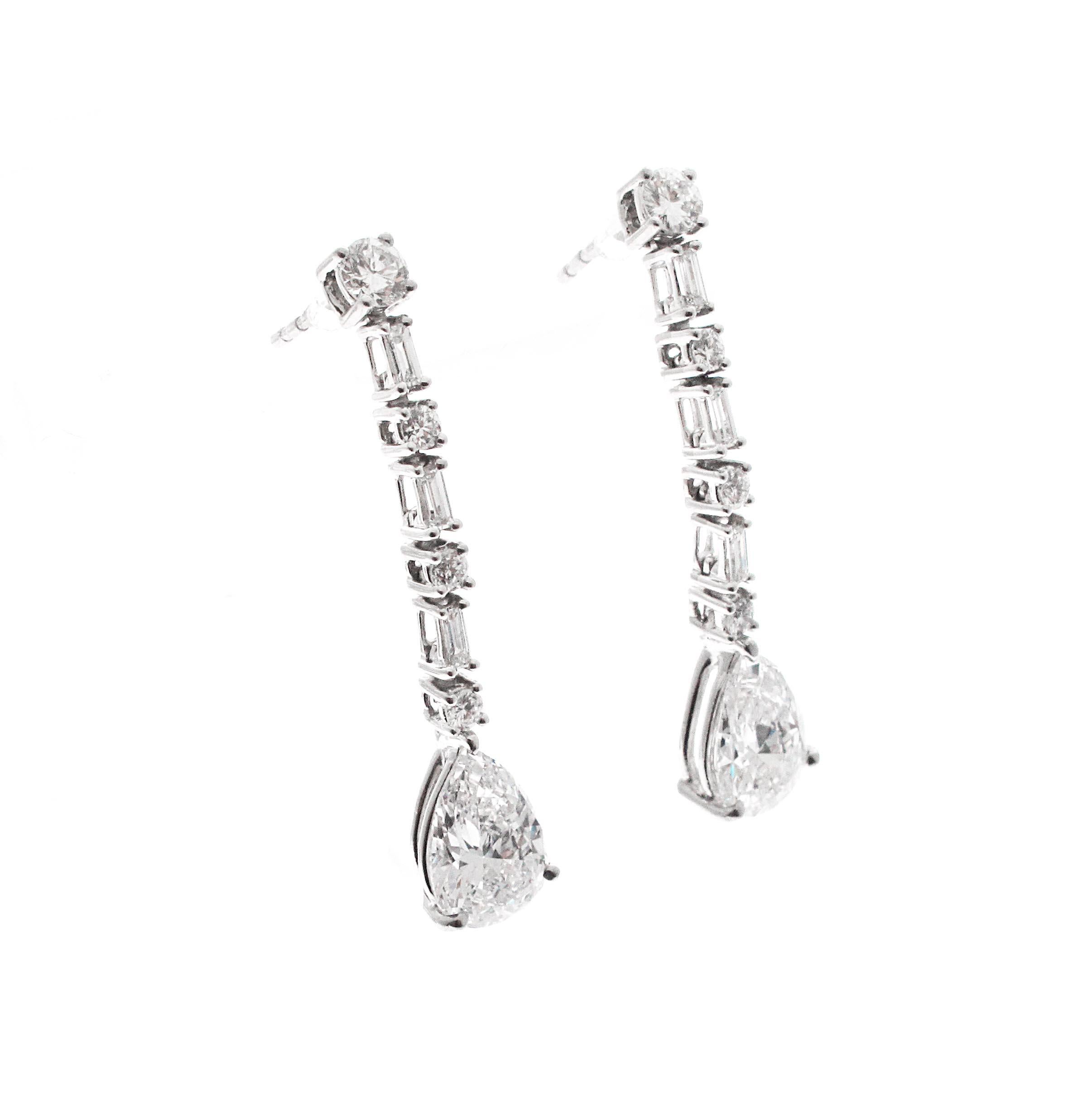 Modern GIA Certified Matching Pear Shape Diamond Earring Drops, 1.44 and 1.37 each