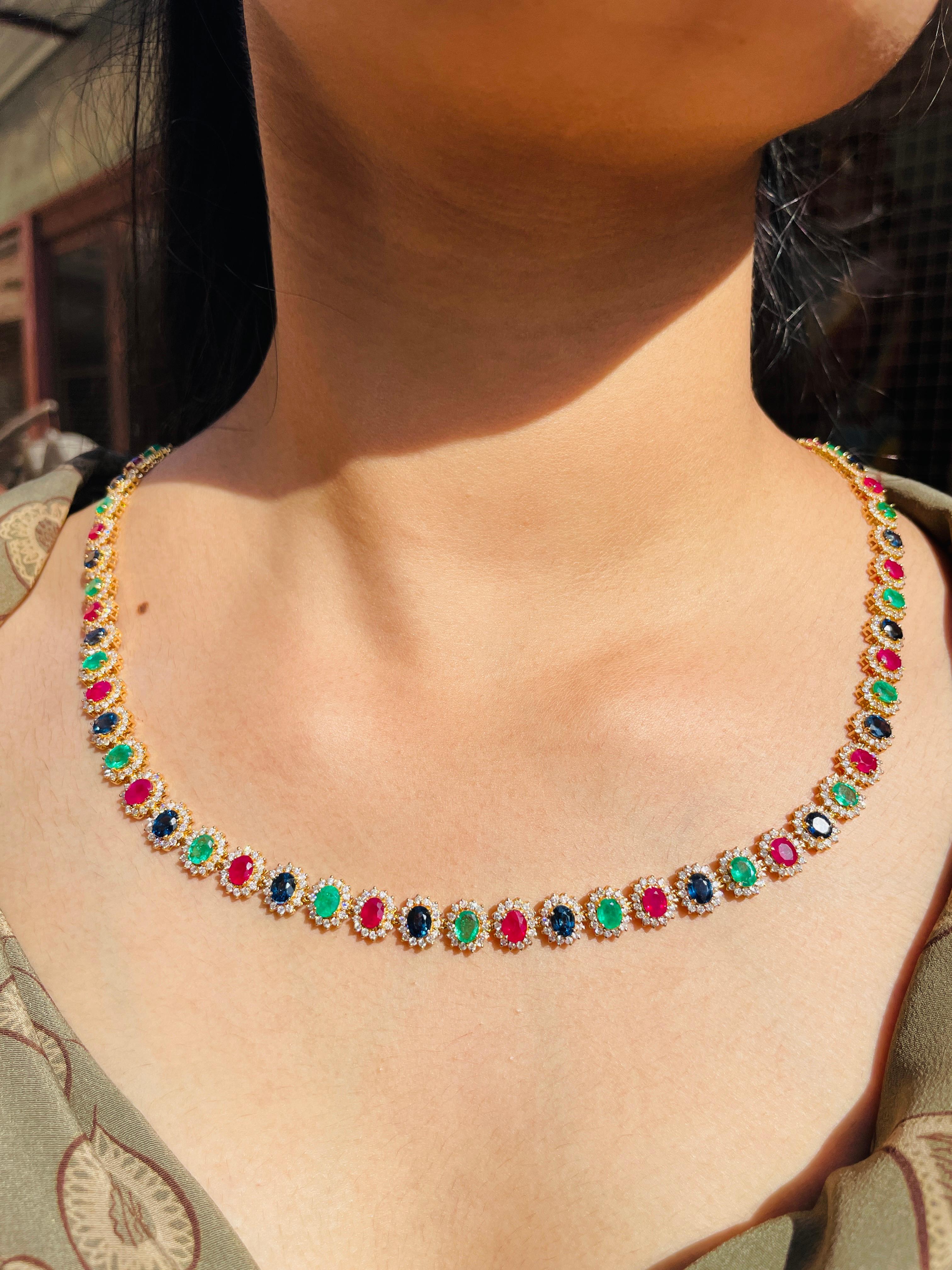 Multi Gemstone Necklace in 18K Gold studded with round cut emerald , ruby , sapphire pieces and diamonds.
Accessorize your look with this elegant multi gemstone beaded necklace. This stunning piece of jewelry instantly elevates a casual look or