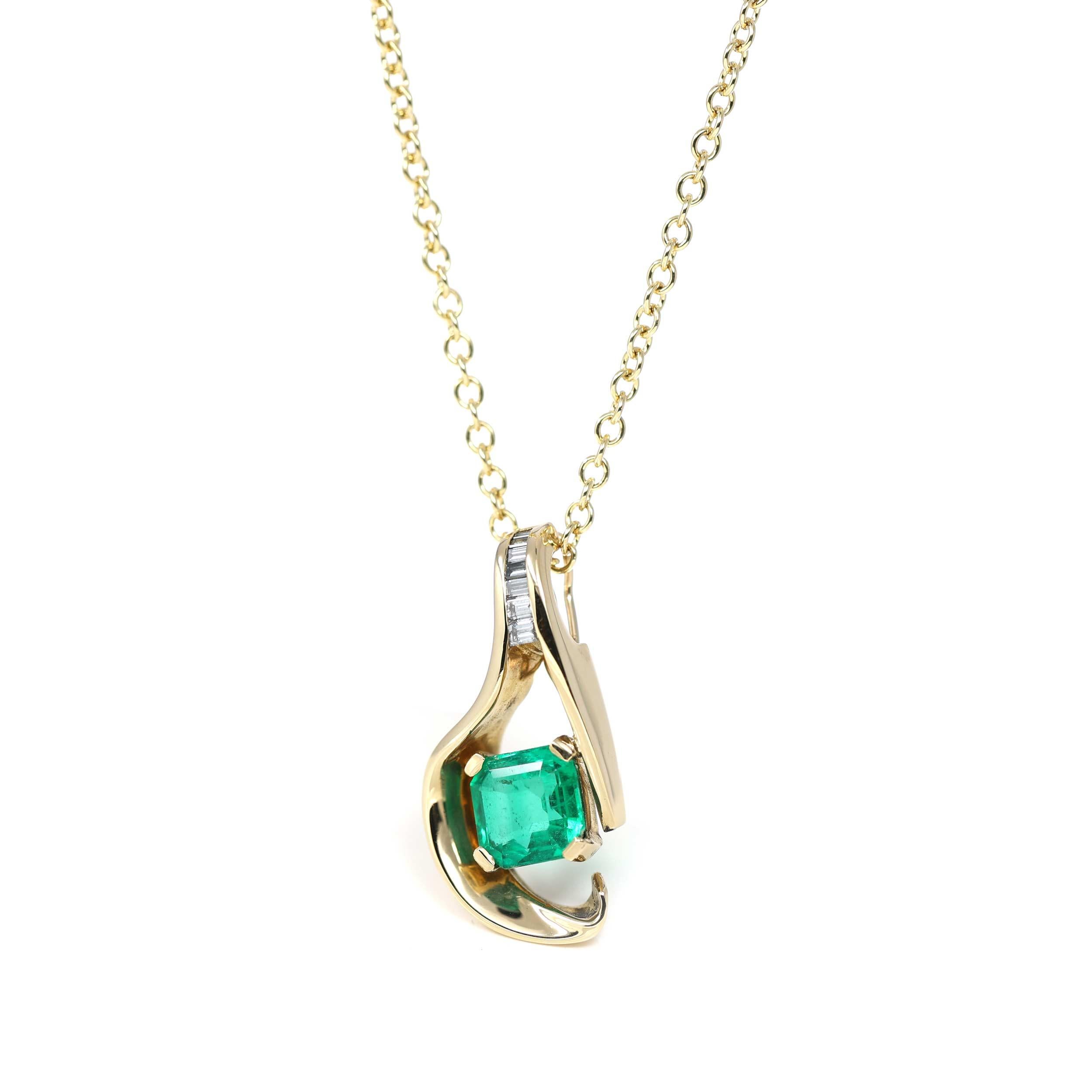 One of A Kind Emerald Necklace. Appraisal and GIA lab report available for the center emerald. Set in exquisite 18k yellow gold free form setting. Perfect for an emerald lover. 