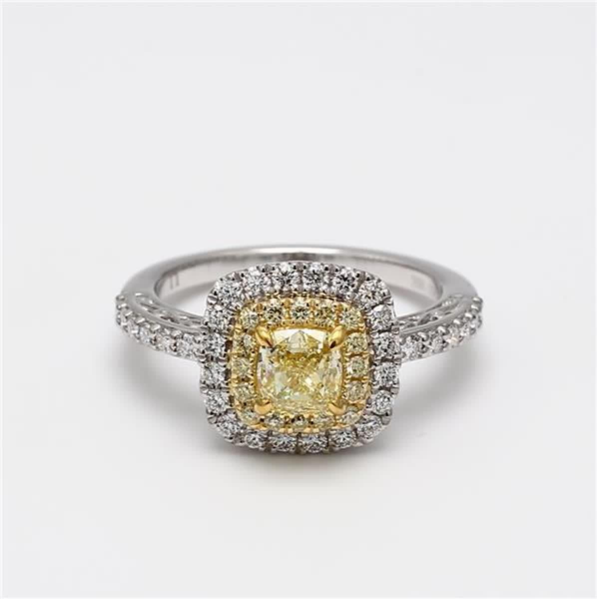 GIA certified rare square cushion natural yellow diamond surrounded with natural round white and yellow diamonds. This ring is designed to be in a simple setting. Can be used as a cocktail ring or in addition to your collection of jewels. 

Total