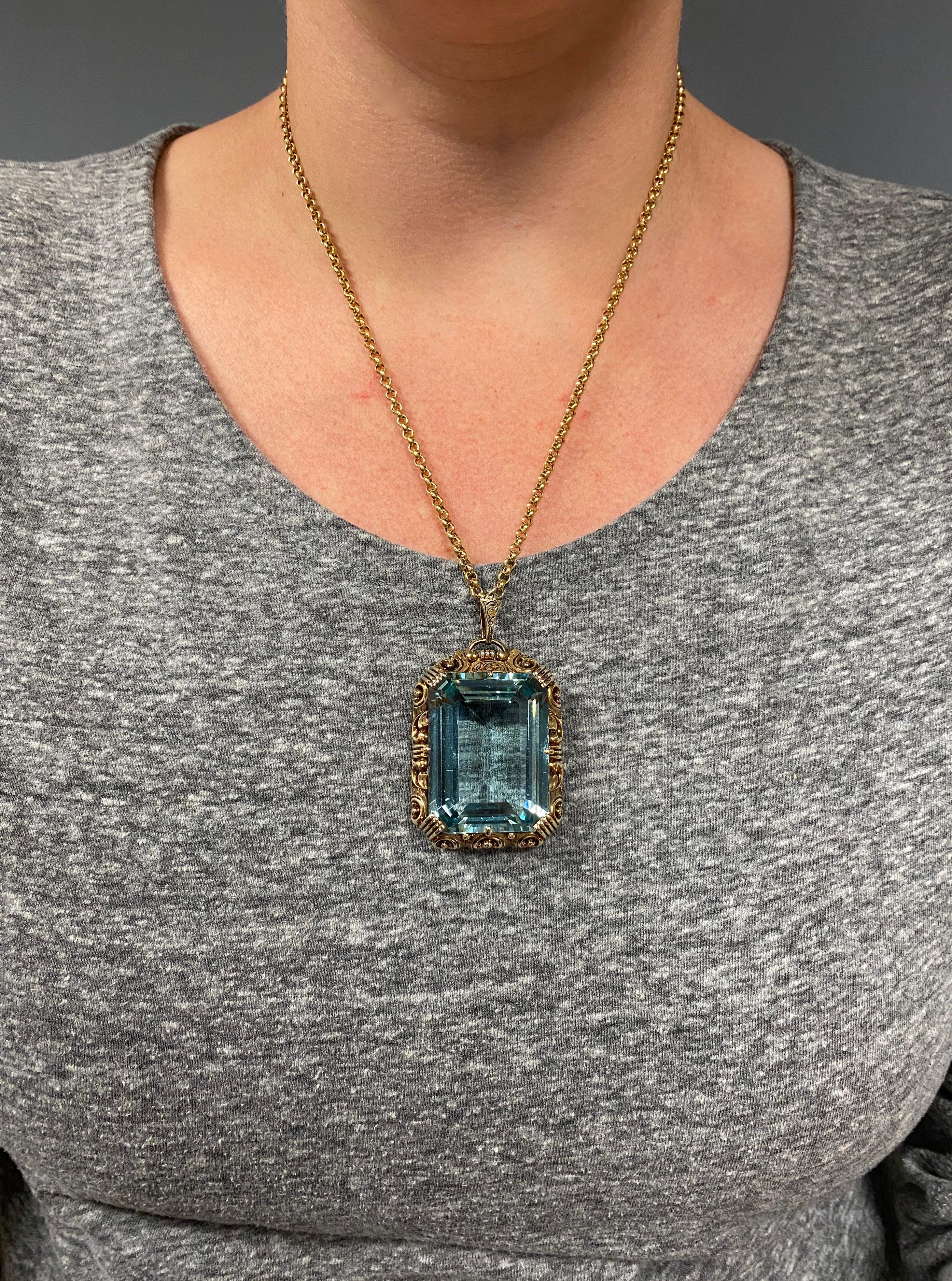 Stunning vintage necklace featuring a large GIA Certified Natural Aquamarine. 

GIA Report # 6214780487
Gemstone: Aquamarine
Gemstone Carat Weight: 36.65 x 27.87 x 13.94mm
Marked/Tested: 