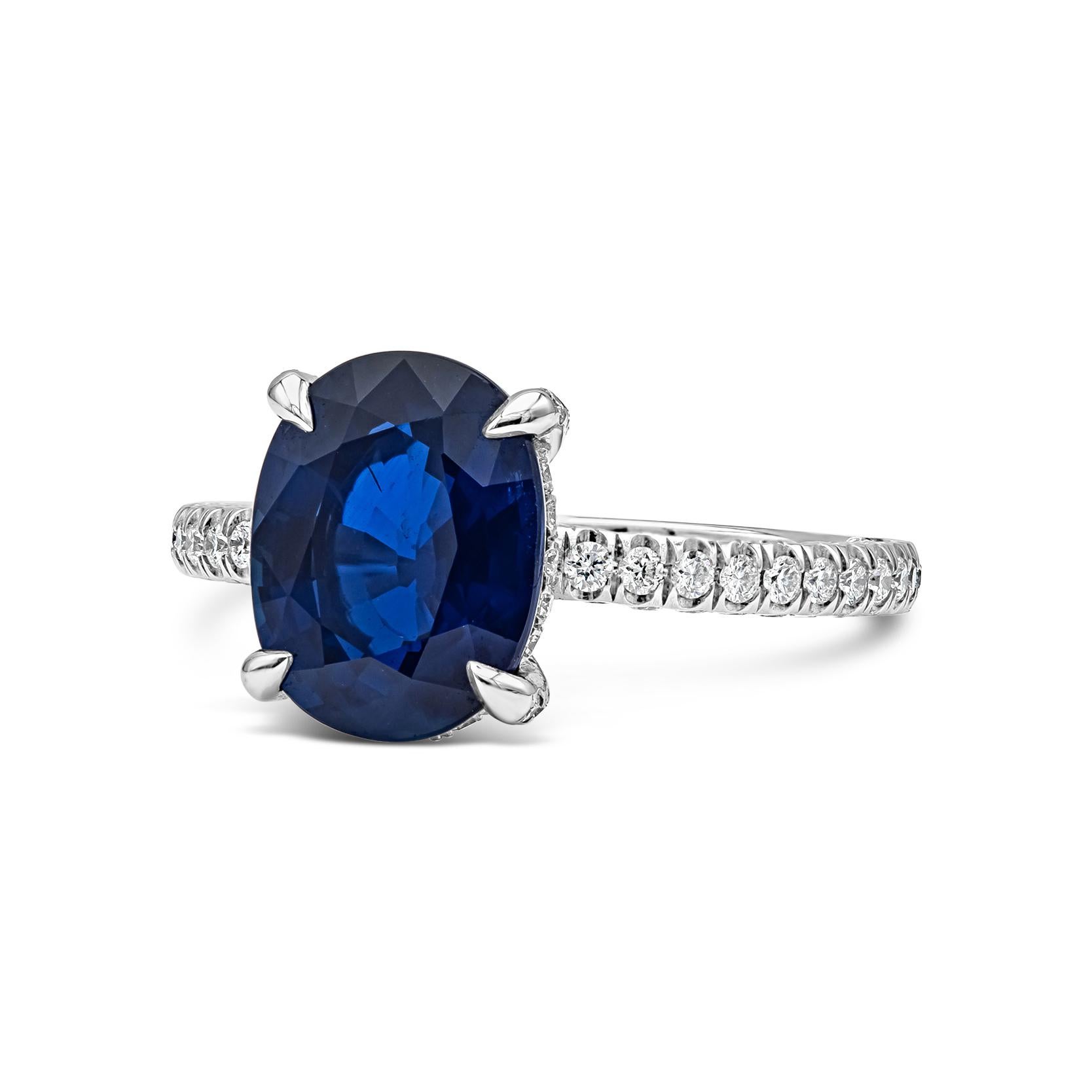 This beautiful and color-rich engagement ring features a 3.84 carats natural oval shaped blue sapphire center stone that GIA certified as Blue in color and does not indicate any heat treatment, set in a classic four prong basket setting. Origin from