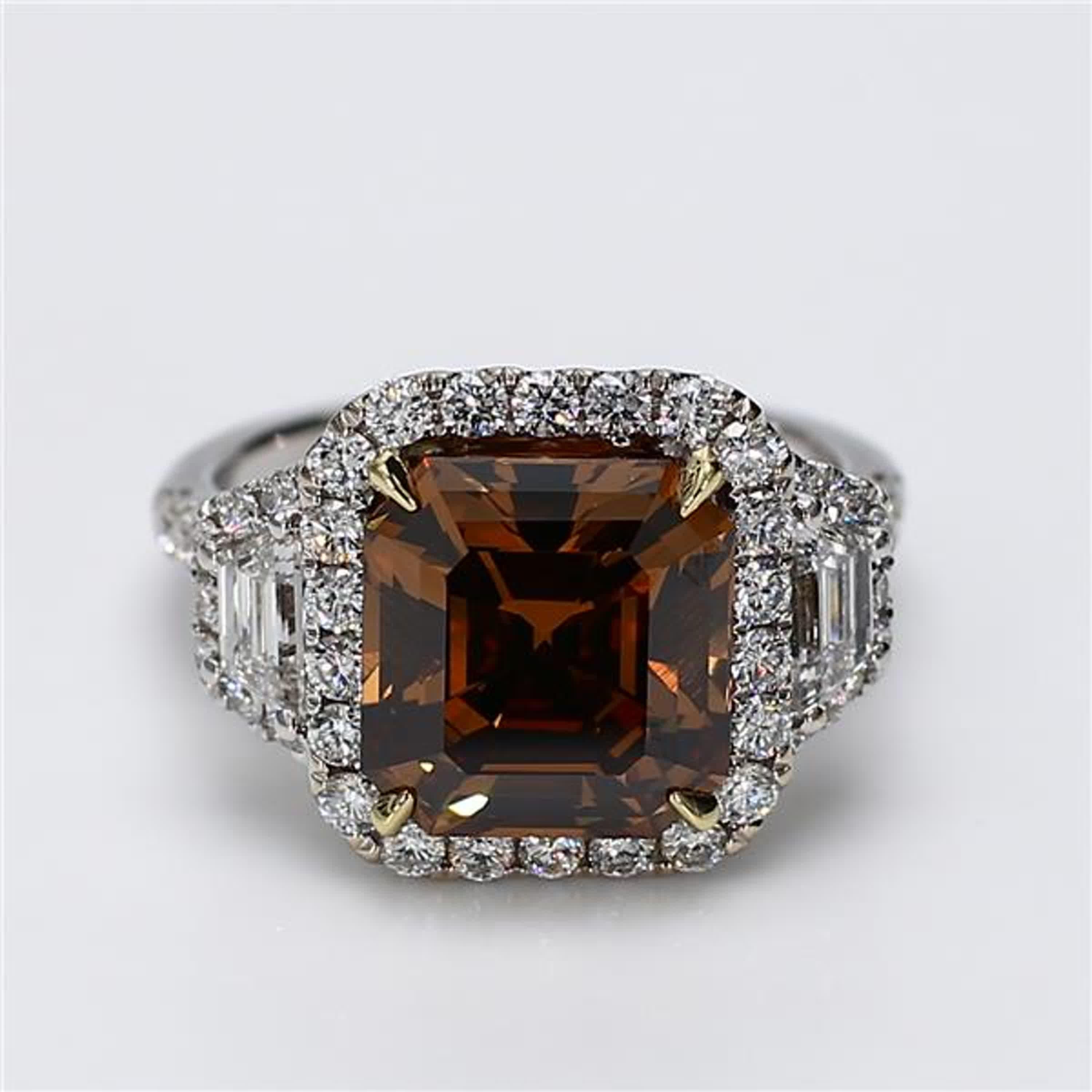 RareGemWorld's classic GIA certified diamond ring. Mounted in a beautiful 18K Yellow and White Gold setting with a natural emerald cut brown diamond. The brown diamond is surrounded by natural trapezoid cut white diamonds and round natural white