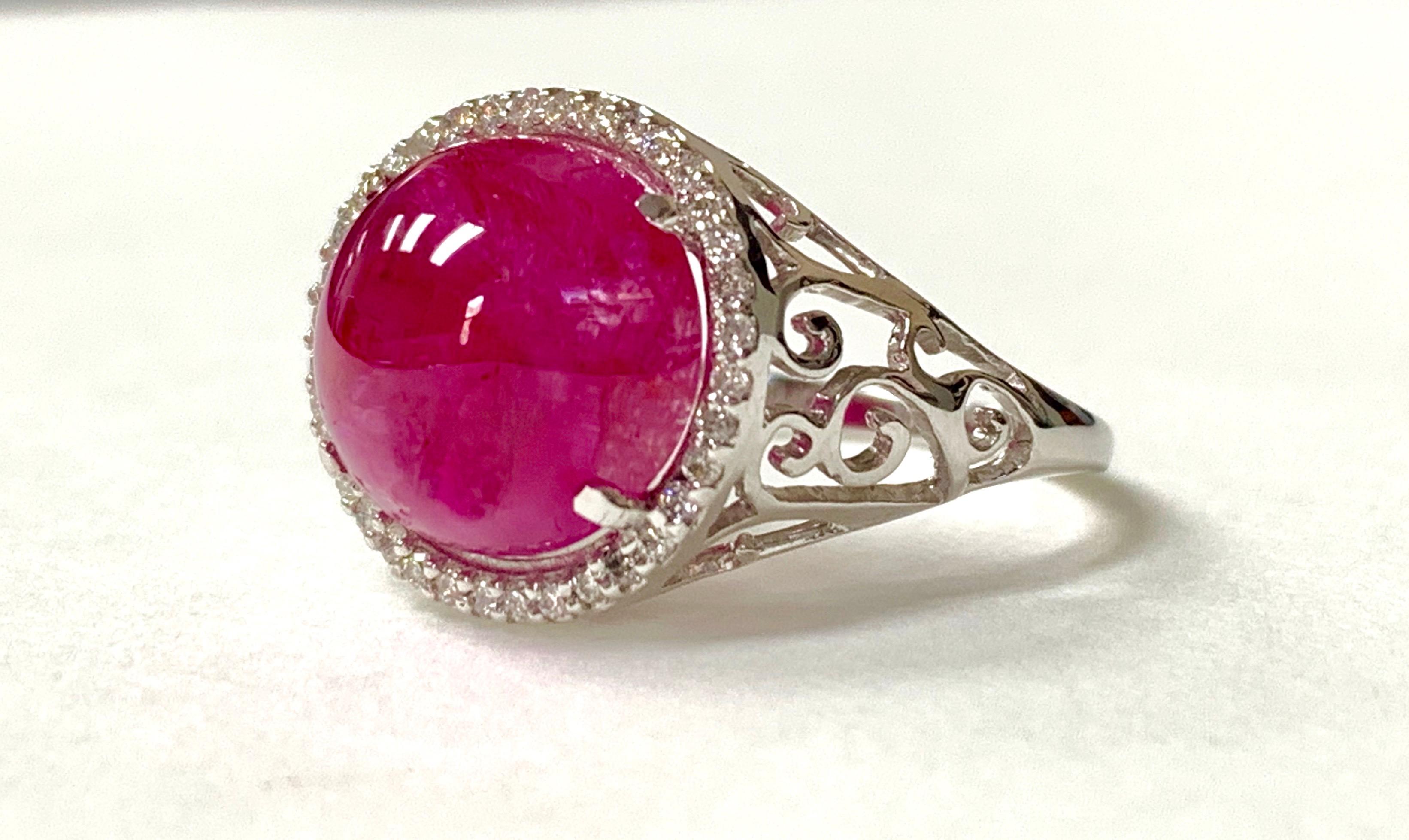 Moguldiam Inc GIA Certified  Natural burma  ruby and diamond ring custom handmade in 18 K white gold. 
The details are as follows : 
Ruby weight : 7.45 carat 
Diamond weight : 0.25 carat 
Gold weight : 4.96 carat 
Ring Size : 6 1/4 