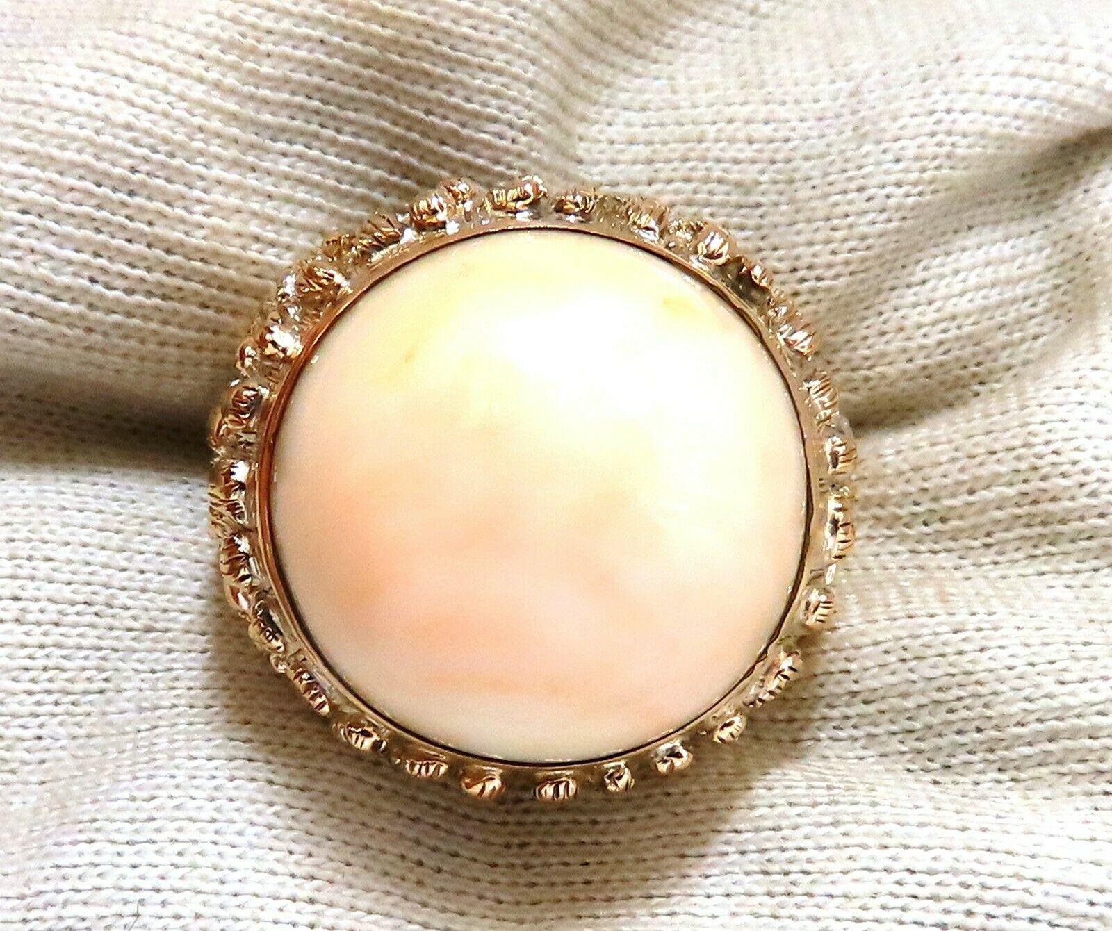 GIA certified Natural Coral Vintage ring.

20 x 20mm

Light orange pink.

No dye, no enhancements.

Ring measures:

13mm depth

25mm wide.

14kt yellow gold.

20.2 grams

Size 8.75

$7000 appraisal & GIA to accompany