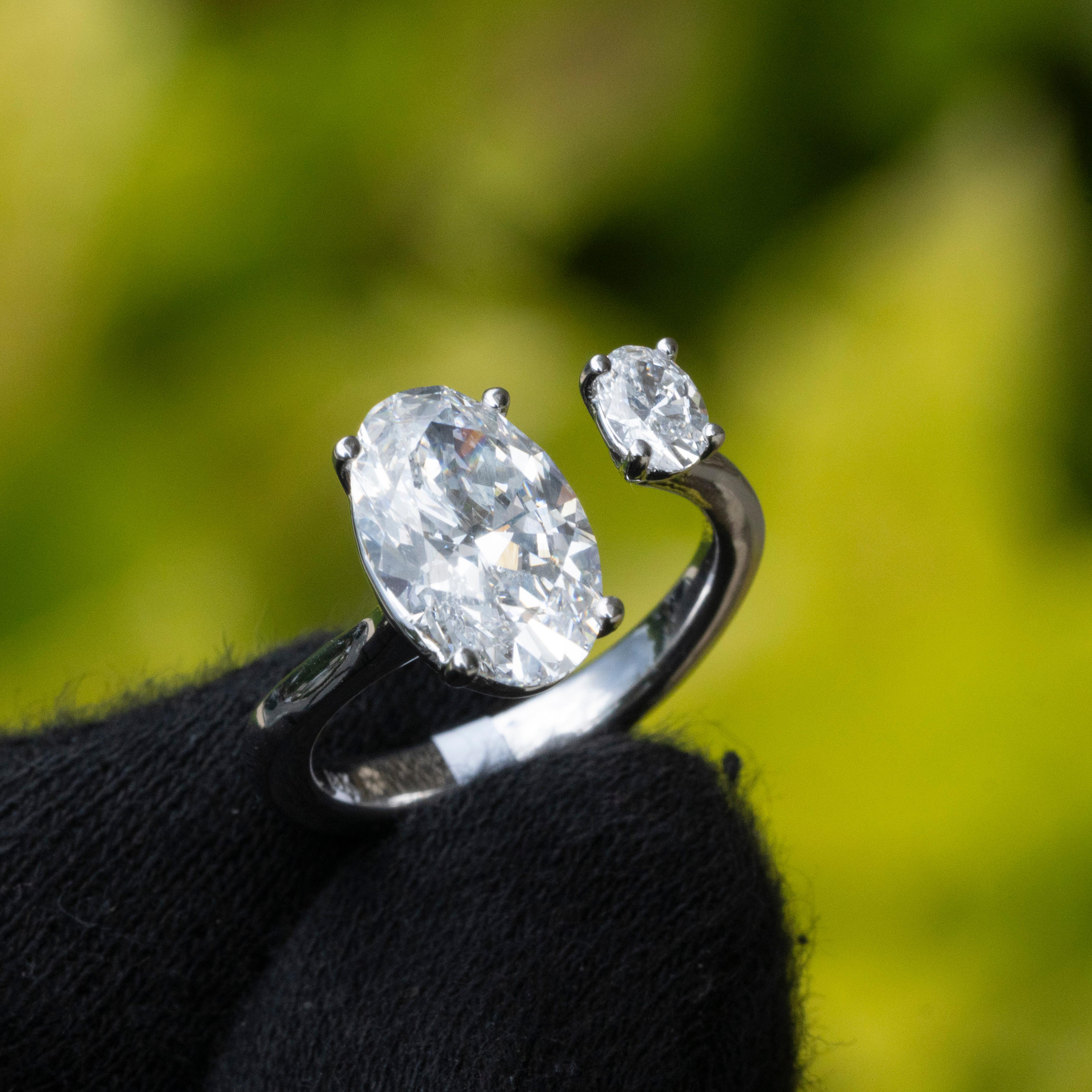 Women's GIA Certified Natural D Flawless Round and Oval Diamond Ring