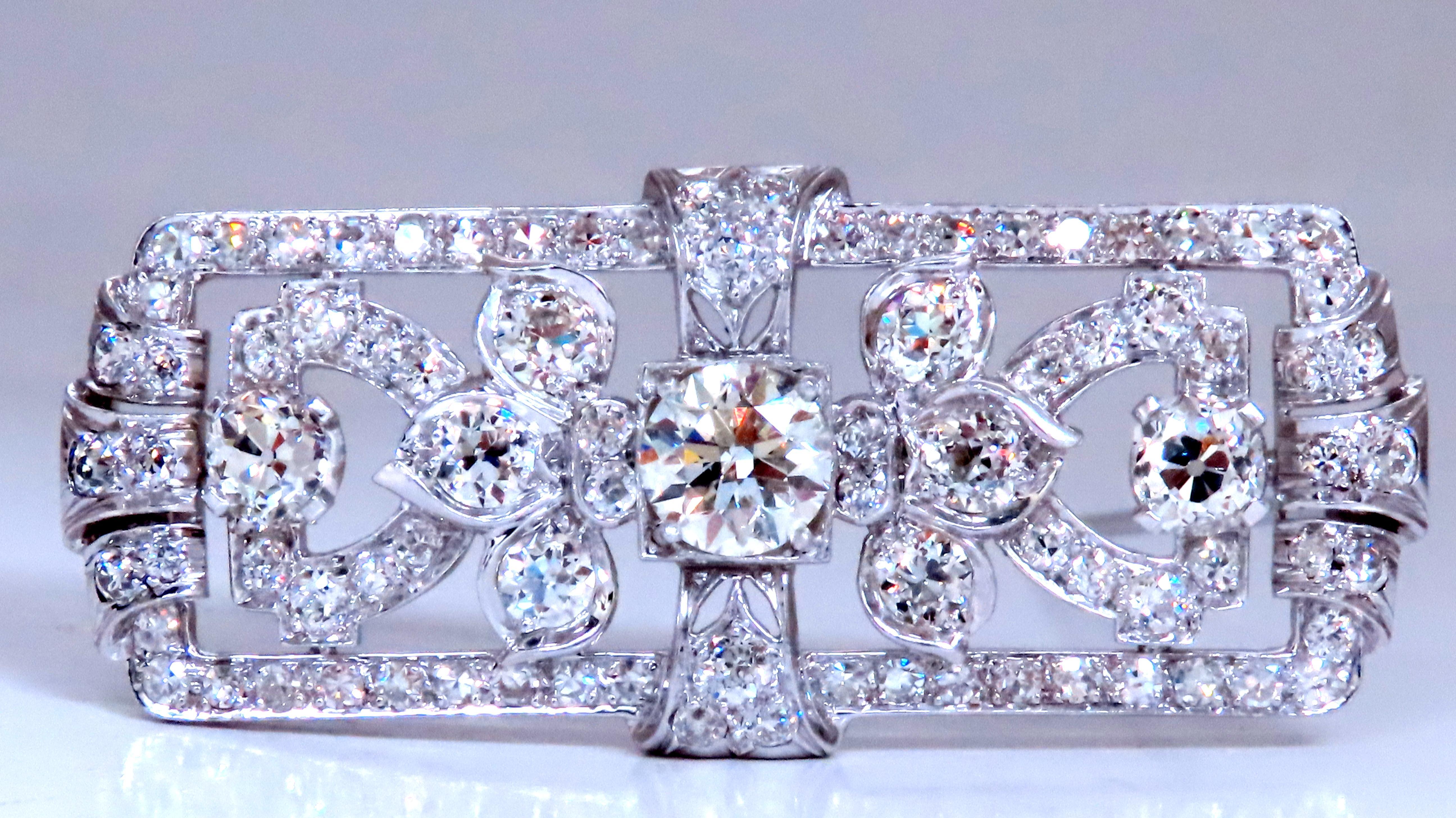 GIA Certified Natural Diamond Pin.
1.20ct  Round
J-color 
I-1 clarity.

All other side round diamonds:
2.50ct H-I color Vs-2 Si-1 clarity.

 Platinum 14.8 grams
 1.9 inch x .83 inch

$25000 appraisal certificate to accompany.