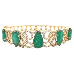 GIA certified Natural emerald and diamond bangle