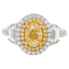 Anillo de compromiso de diamante amarillo claro fantasía natural certificado por GIA 2,14 quilates 18K