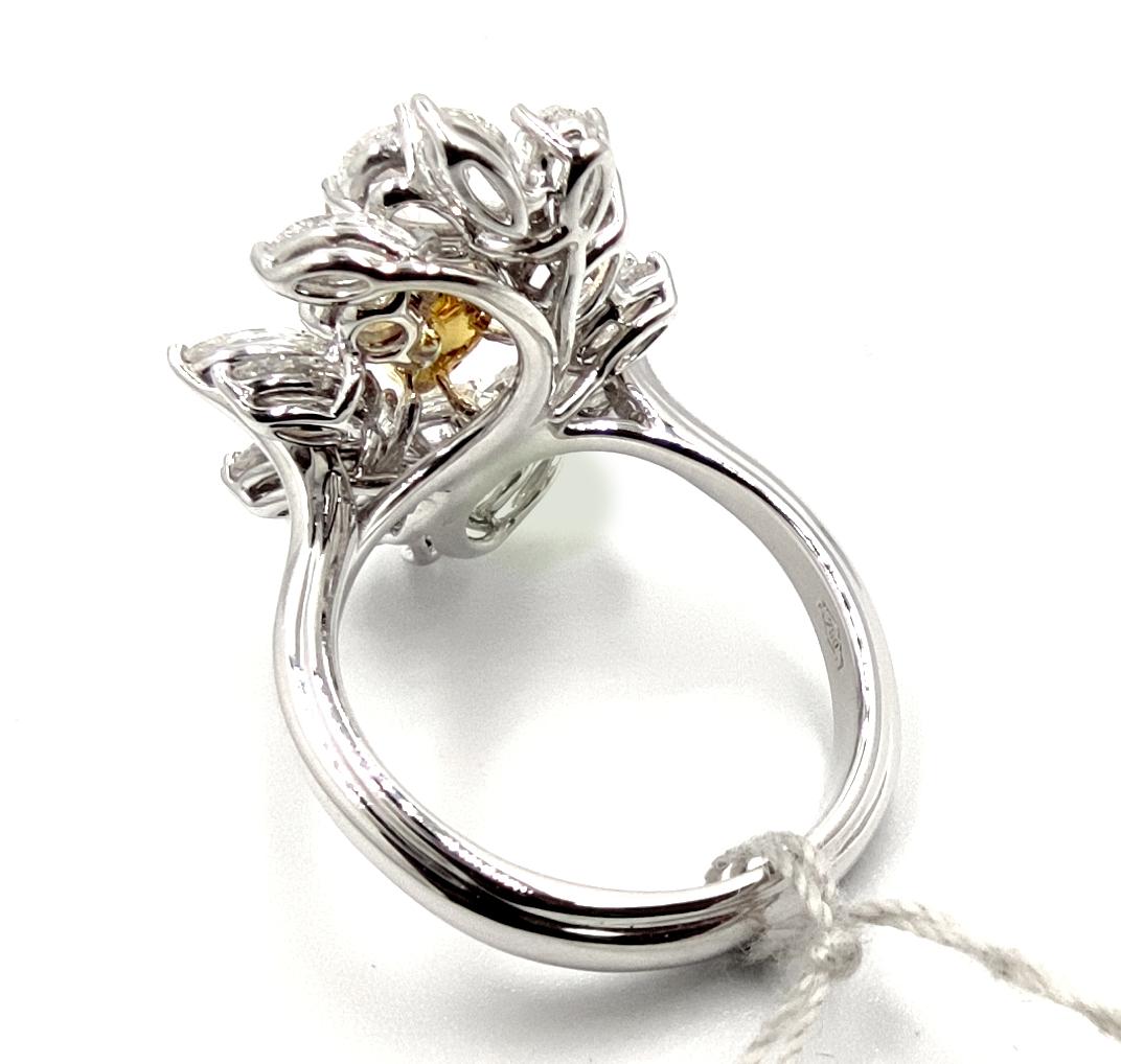 Women's or Men's GIA Certified Natural Fancy Light Yellow Pear Diamond 18k White Gold Ring For Sale