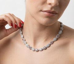 Collana con doppio halo di Pink Diamonds naturali certificati GIA, per un totale di 16 carati