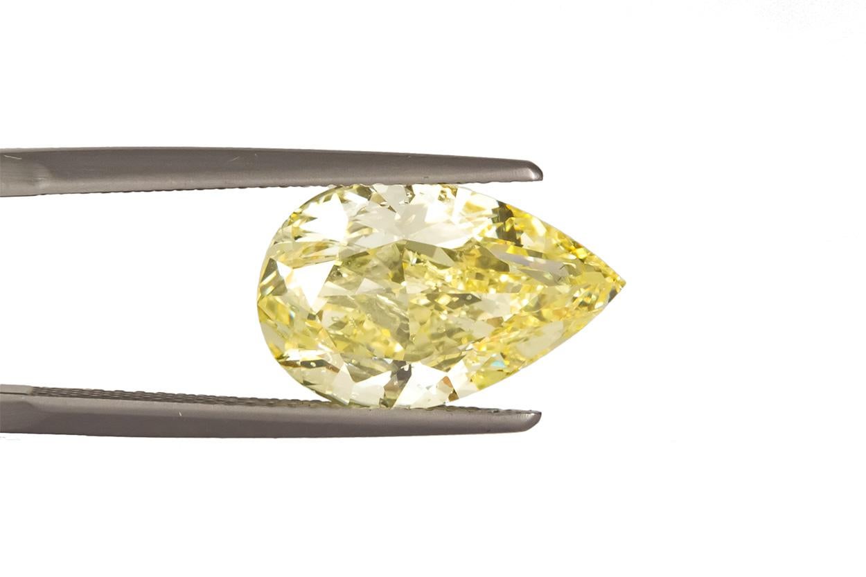 Modern GIA Certified Natural Fancy Yellow 5.01 Carat SI1 Pear Cut Diamond