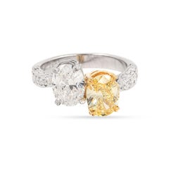 GIA Certified Natural Fancy Yellow and White Diamond "Toi et Moi" Crossover Ring
