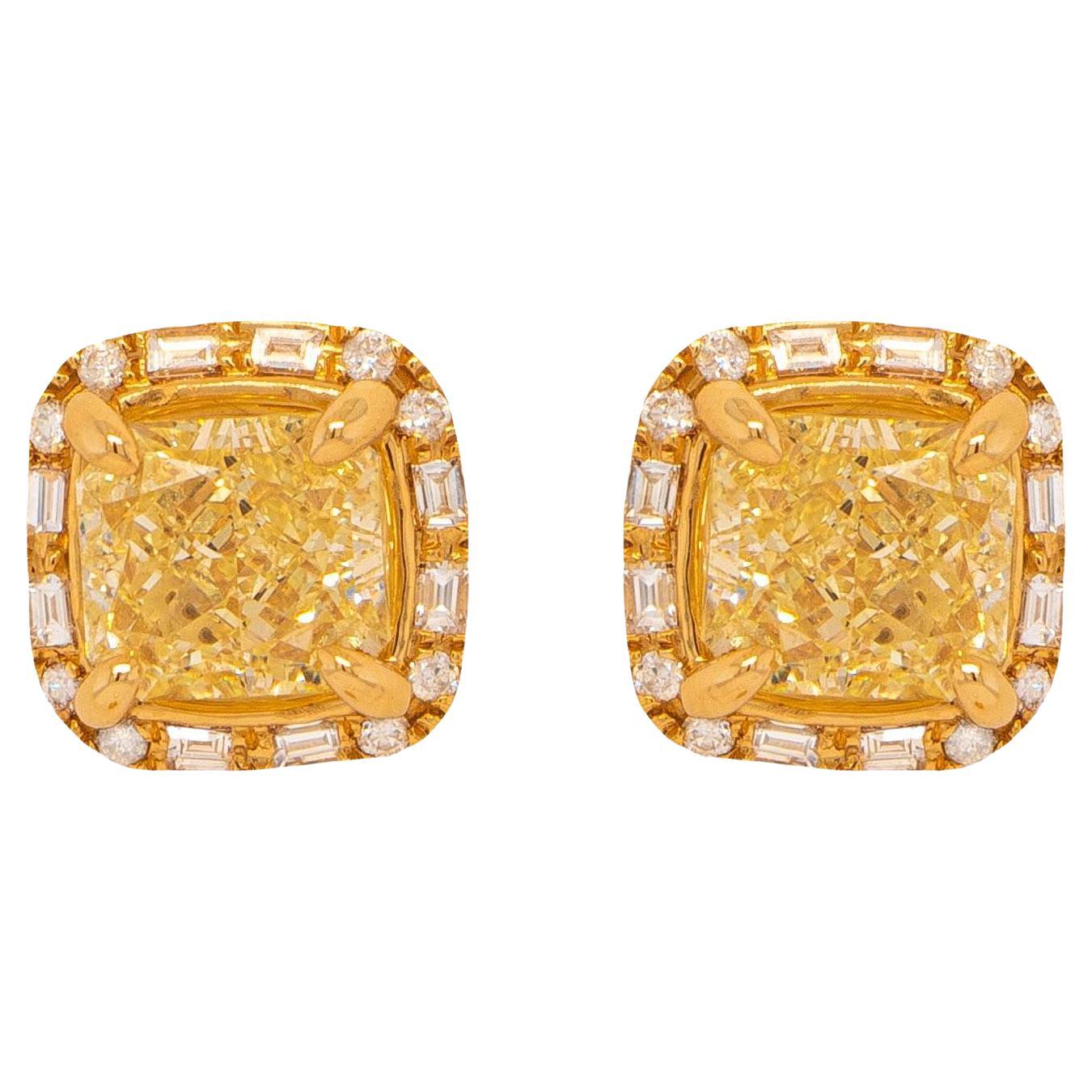 Two Original GIA Certificates are included
2 GIA Certified Natural Yellow Diamonds = 2.02 Carats
(Cut: Radiant; Color: U-V, W-X; Clarity: VS)
Other Diamonds = 0.25 Carats
(Cut: Baguette, Round; Color: G-H, Clarity: VVS-VS)
Metal: 18K Yellow Gold
