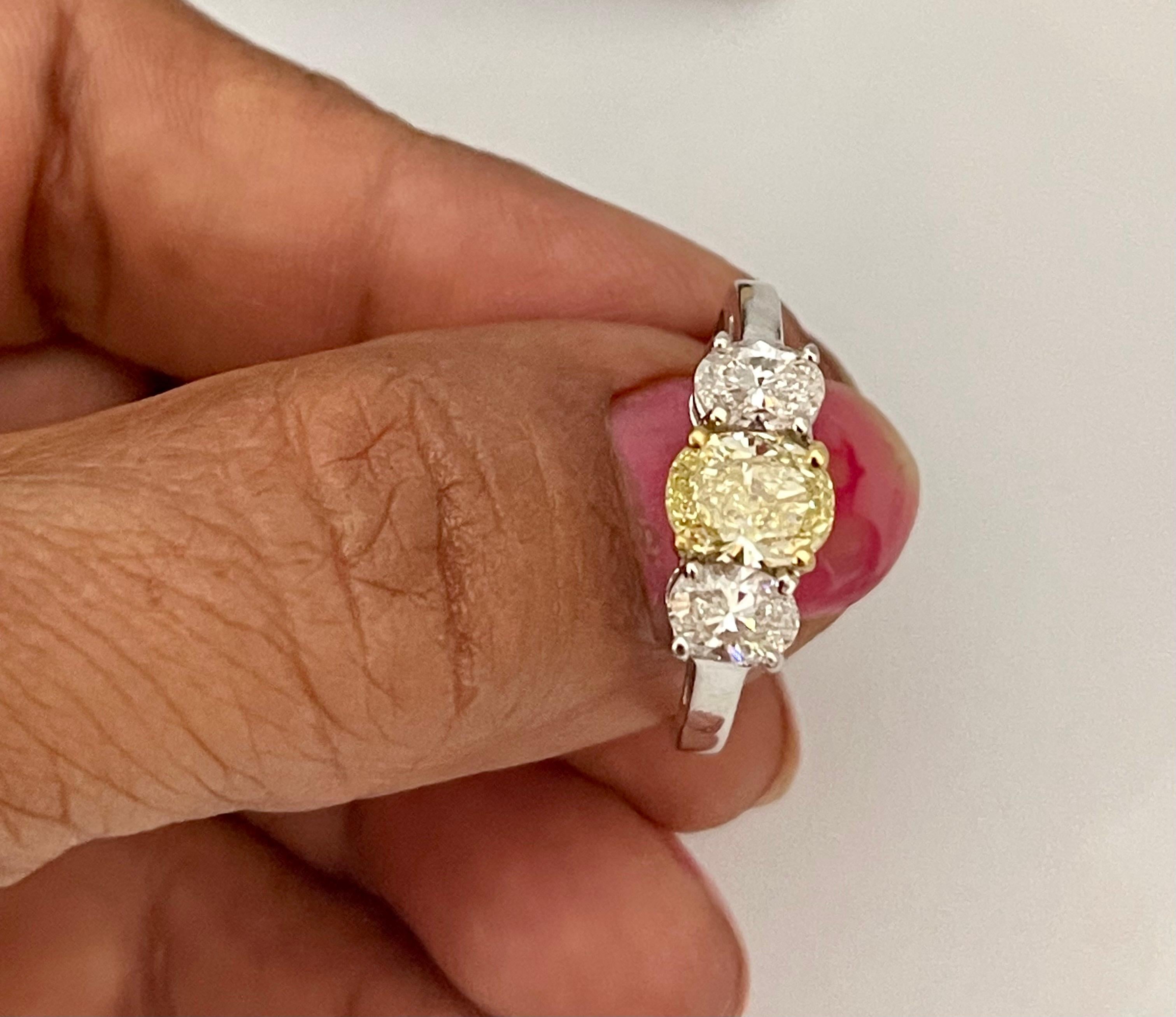 GIA Certified Natural Fancy Yellow & White Diamond Three Stone Engagement Ring  In Excellent Condition For Sale In New York, NY