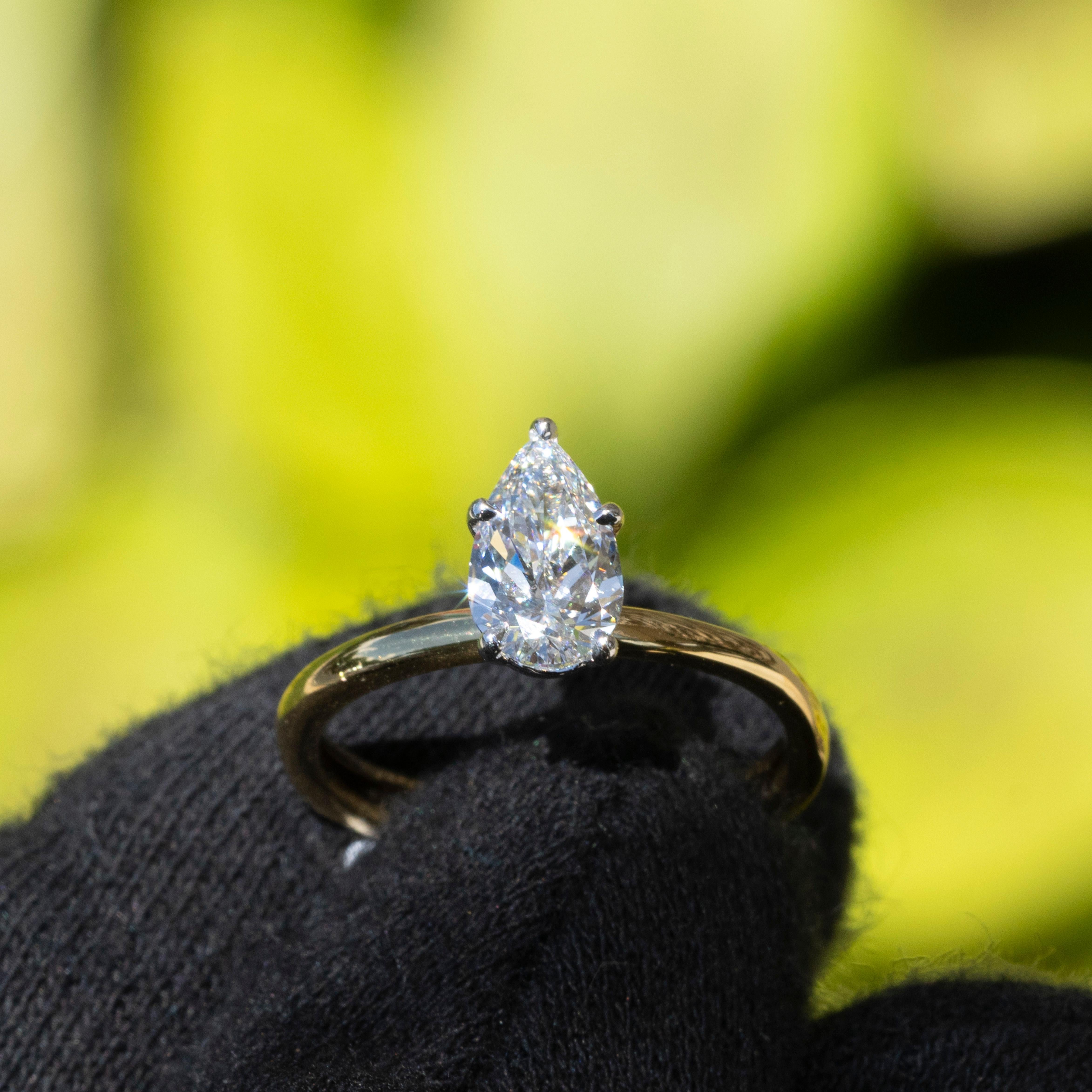 This elegant engagement ring features a 1.11-carat natural oval brilliant diamond set in 18k yellow gold. The diamond is GIA certified with top grades in color (D), clarity (Flawless), polish, and symmetry, ensuring maximum brilliance and beauty.