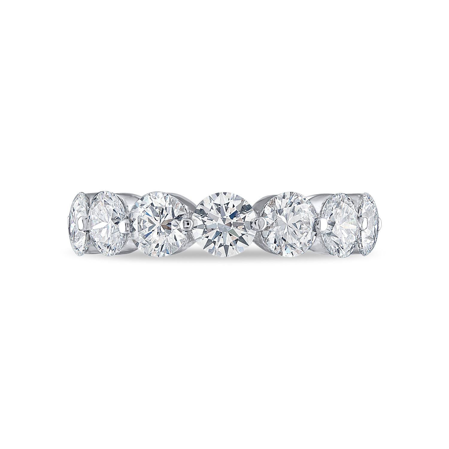 This stunning eternity ring features a total of 5.6 carats of natural round brilliant diamonds set in 18k white gold. Each diamond is GIA certified with top grades in color (D), clarity (Flawless), cut, symmetry, and polish, ensuring maximum