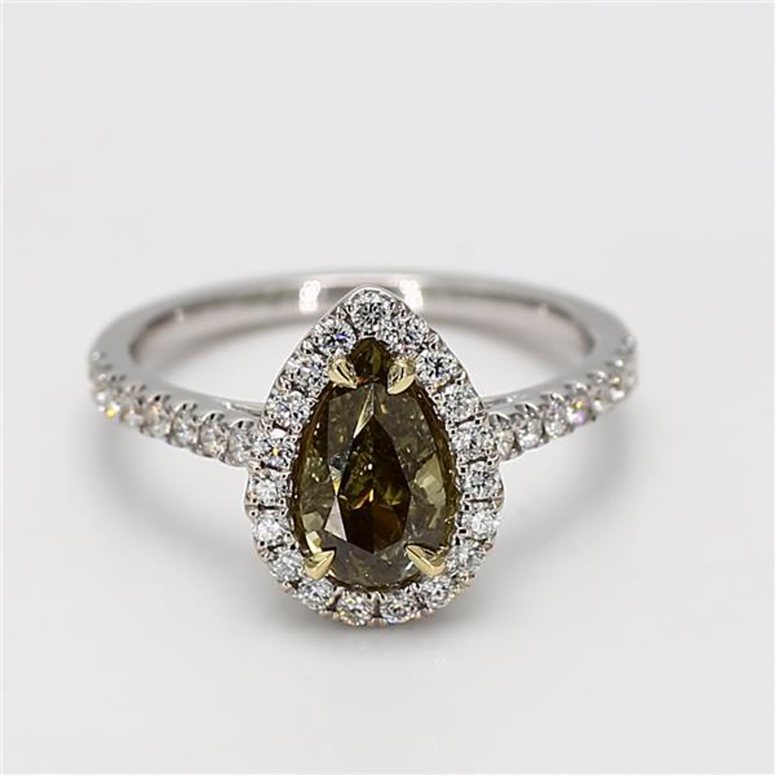 RareGemWorld's classic GIA certified diamond ring. Mounted in a beautiful 18K Yellow and White Gold setting with a natural pear cut green diamond. The green diamond is surrounded by round natural white diamond melee. This ring is guaranteed to