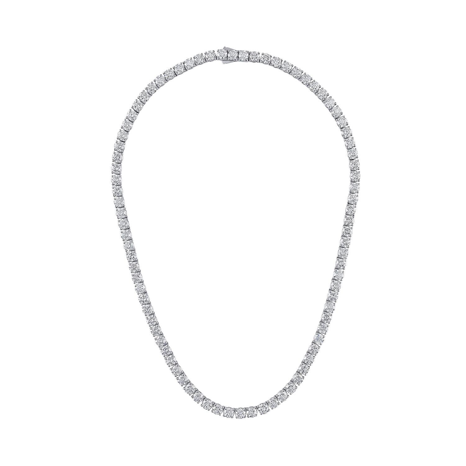 This magnificent 18k white gold tennis necklace features a total of 33.6 carats of natural round brilliant diamonds. The diamonds are GIA certified with D color and Internally Flawless clarity, ensuring maximum brilliance and purity. Each diamond is