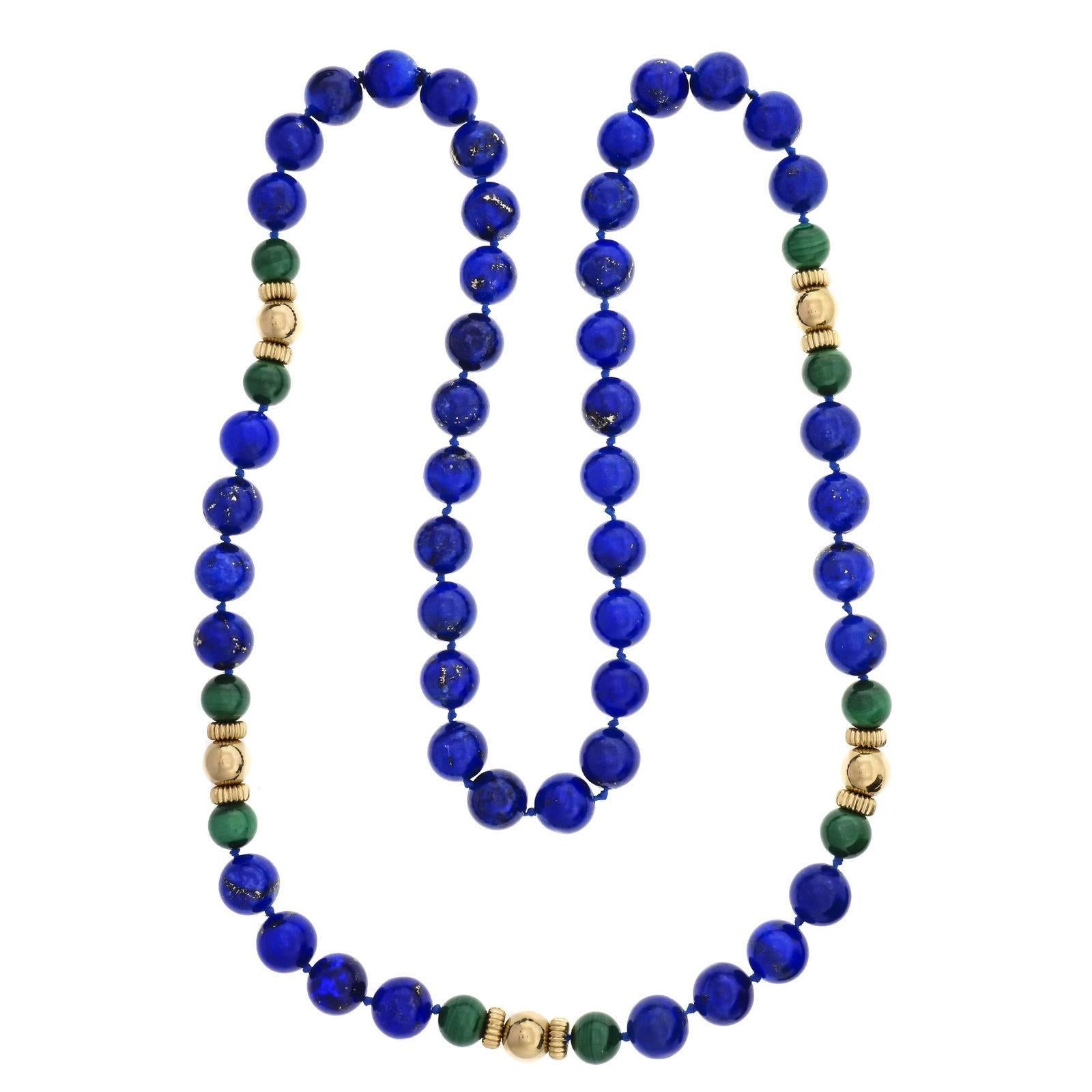 Mid-century 1950-1960 natural blue Lapis GIA certified with natural Malachite and 14k gold beads spacers. 32 inches. 

14k yellow gold
47 round blue Lapis Lazuli, 12.5mm, GIA certificate #2185876833
10 round green Malachite beads, 9.86mm
5 round