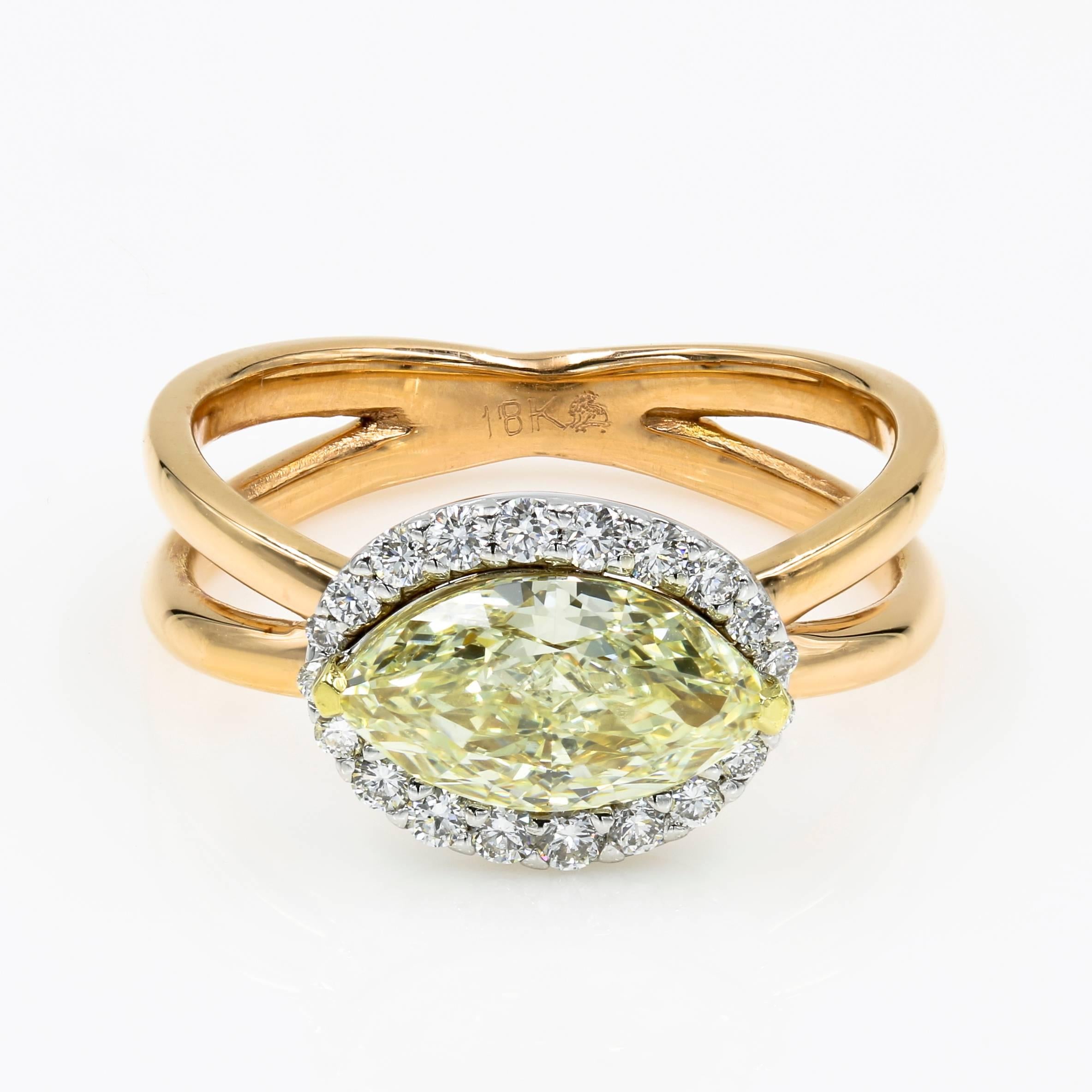 This stunning 1.50cts. marquise cut Chardonnay Diamond® ring  is W-X color and VS1 clarity. The diamond has a unique serial number on the girdle along with the Chardonnay Diamond® Logo. It is set in 18kt. yellow, rose & white gold with 20 ideal cut