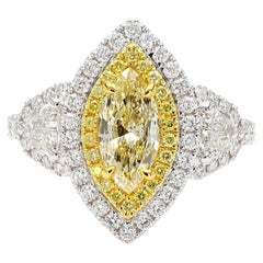 GIA Certified Natural Light Yellow Marquise Diamond 2.19 Carat TW Gold Ring