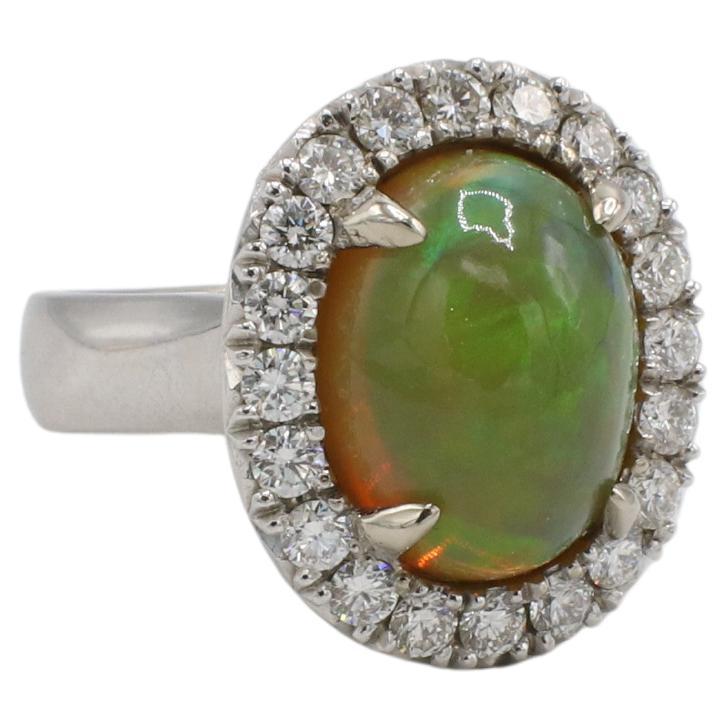 GIA Certified Natural Opal & Diamond Halo Dome Cocktail Statement Ring 
Metal: 14k white gold
Weight: 13.16 grams
Diamonds: Approx. 1.00 CTW F-G VS round natural diamonds
Opal: GIA certified natural semi-transparent yellow-orange displaying play of