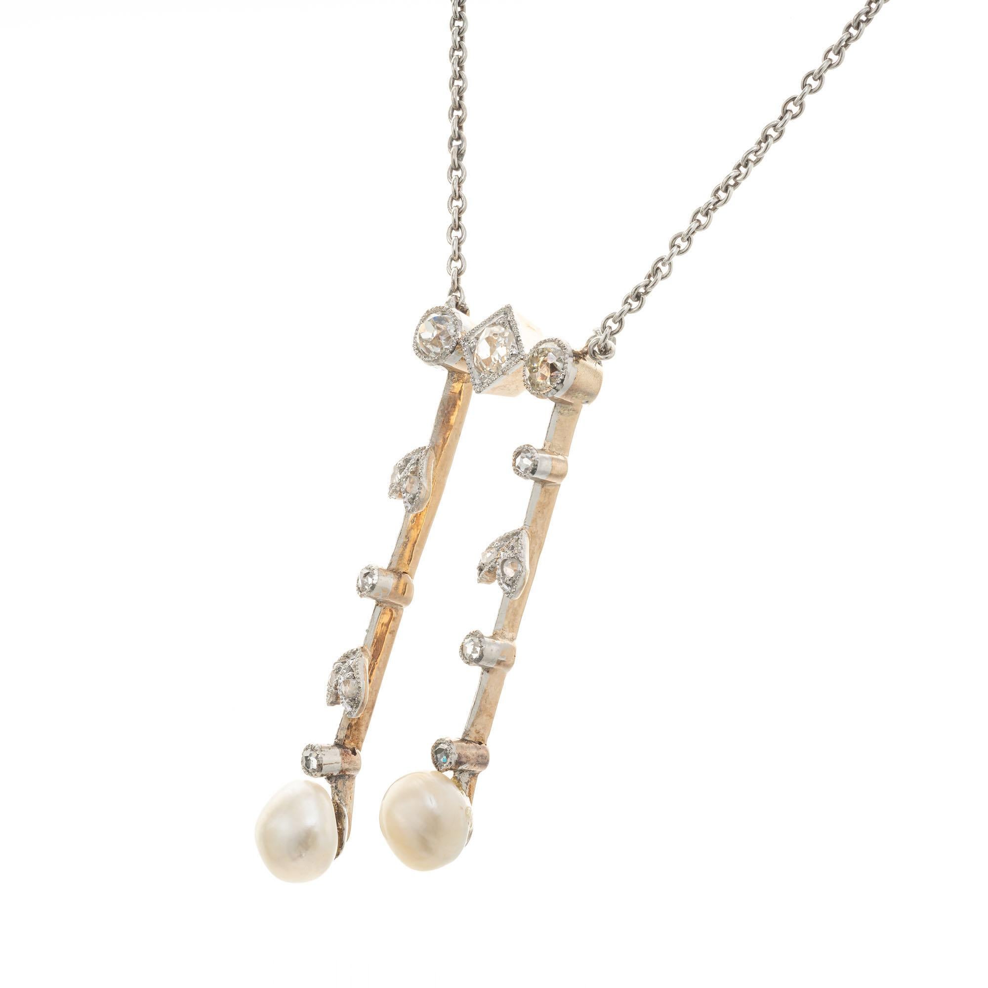 Victorian silver topped 14k gold double dangle diamond and natural pearl drop pendant necklace. The 15.75 inch chain and catch are white gold. All original old mine and rose cut diamonds. Both pearls are GIA certified as natural pearls, saltwater,