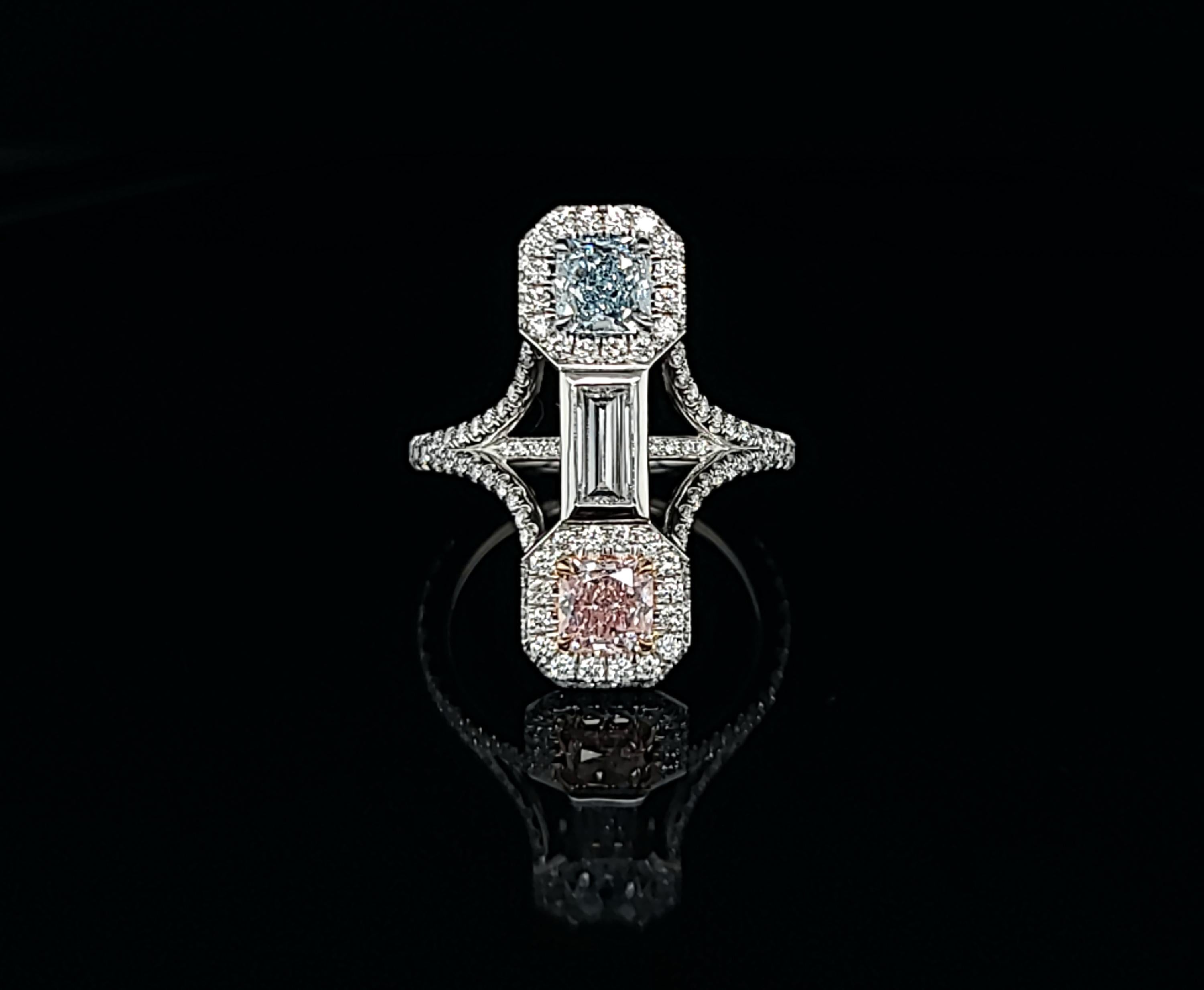 Make a bold statement with our extraordinary handmade ring, showcasing two natural and rare color diamonds that are truly exceptional. The centerpiece of this stunning ring is a 0.50-carat fancy pink radiant diamond, certified by GIA with the