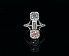 GIA Certified .50 Natural Pink and .53 carat Natural Blue Diamond Platinum Ring