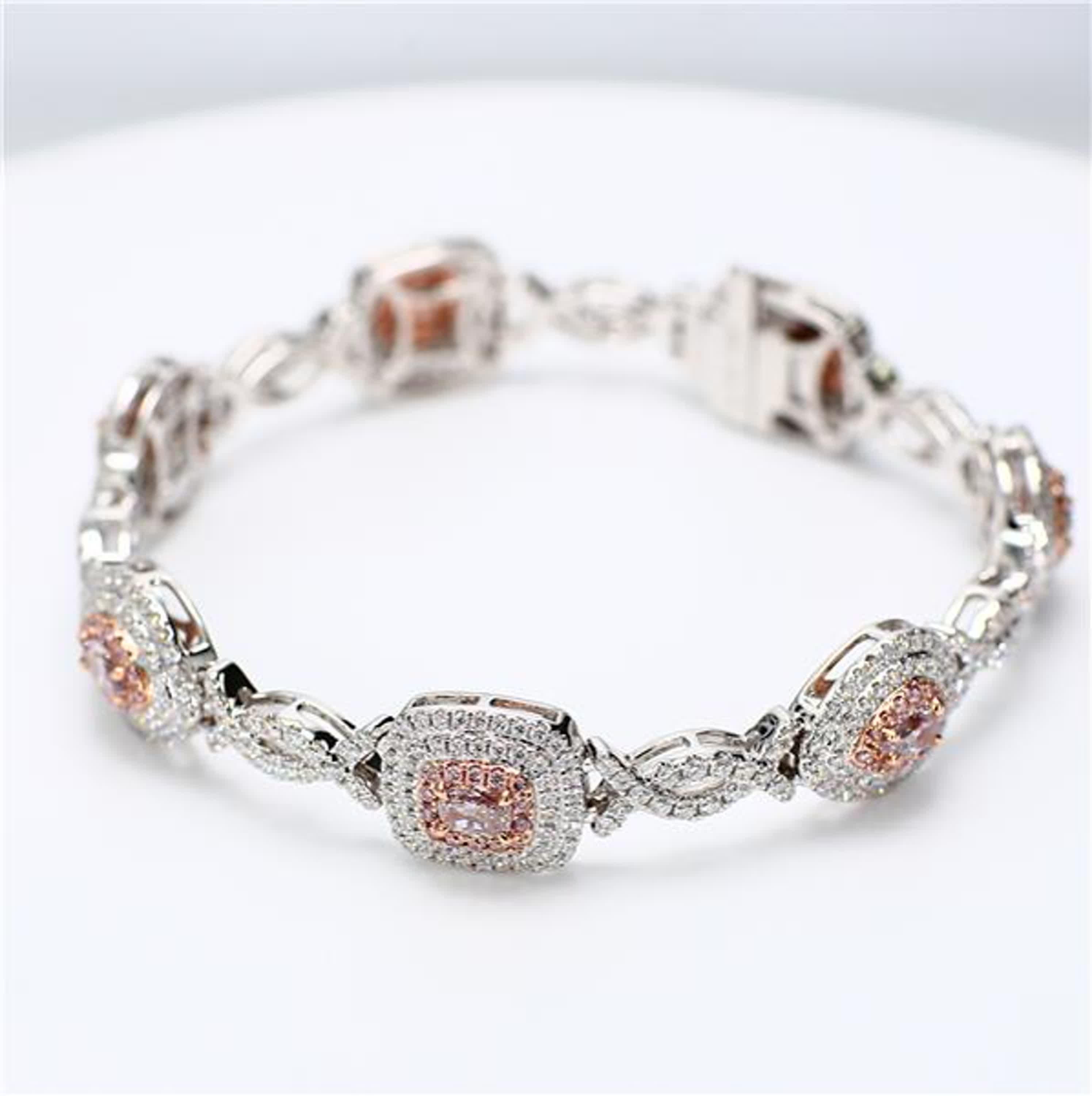 RareGemWorld's intriguing diamond bracelet. Mounted in a beautiful 18K Rose and White Gold setting with 2 natural oval cut pink diamonds, 2 natural cushion cut pink diamonds, 1 natural radiant cut pink diamond, 1 natural marquise cut pink diamond,