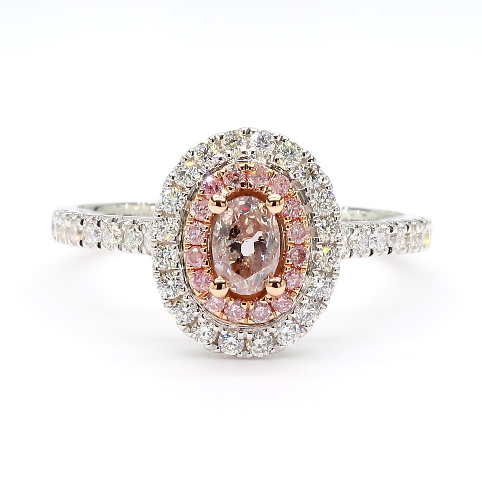 Contemporary GIA Certified Natural Pink Oval Diamond 0.71 Carat TW Gold Cocktail Ring For Sale