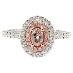 GIA Certified Natural Pink Oval Diamond 0.71 Carat TW Gold Cocktail Ring
