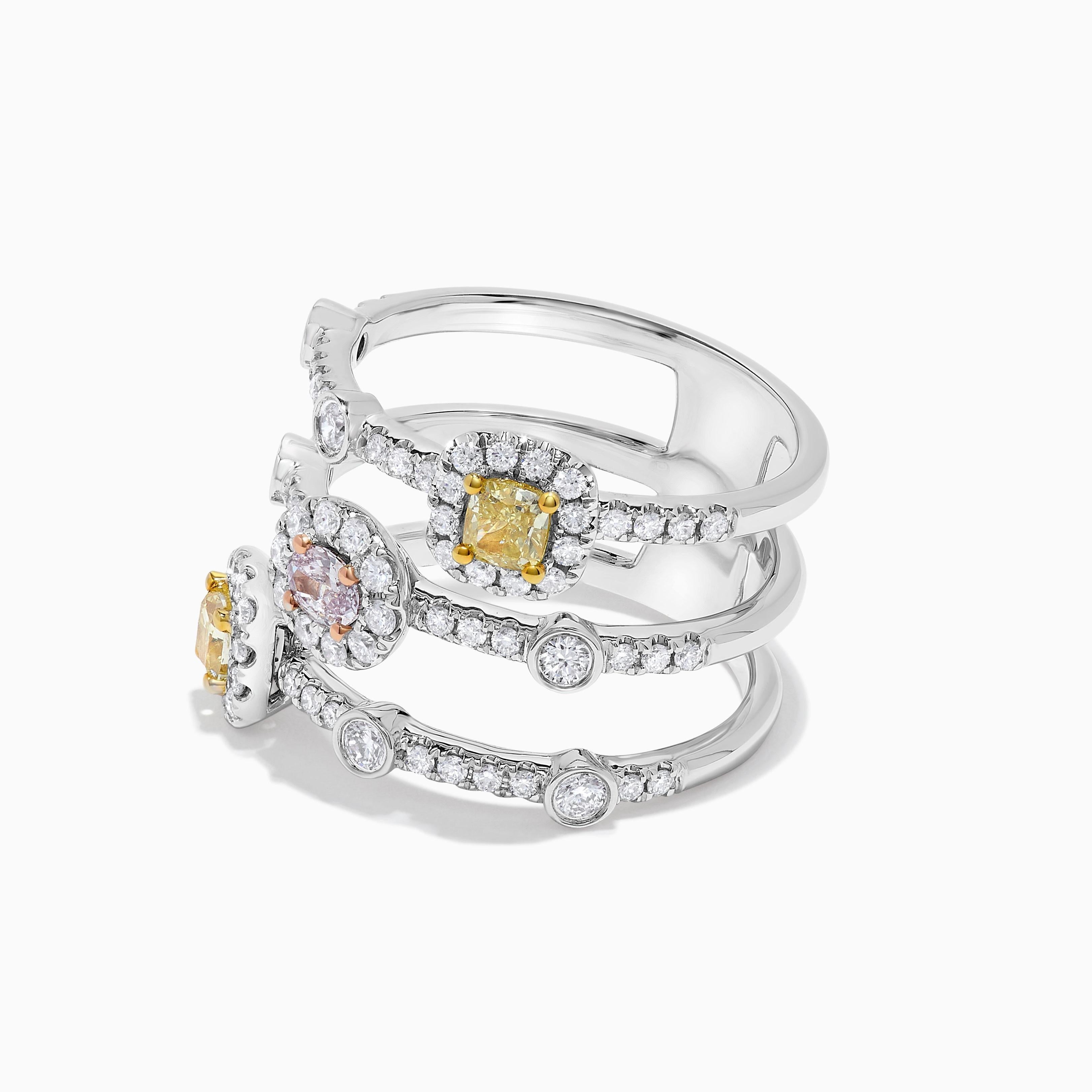 RareGemWorld's beautiful GIA certified diamond ring. Mounted in a beautiful 18K Rose and White Gold setting with a natural oval cut pink diamond as well as two natural cushion cut yellow diamonds. The diamonds are surrounded by round natural white