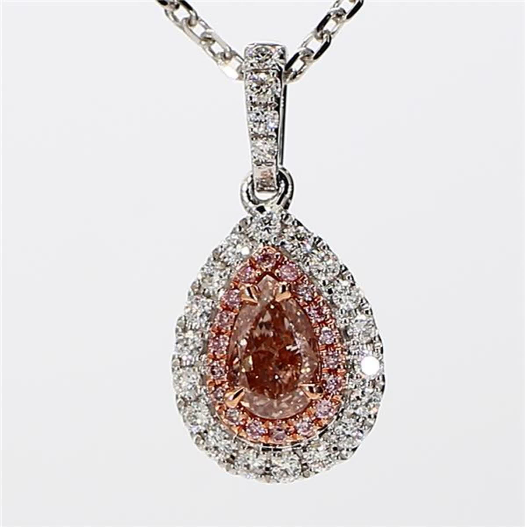 RareGemWorld's intriguing GIA certified diamond pendant. Mounted in a beautiful 18K Rose and White Gold setting with a natural pear cut pink diamond. The pink diamond is surrounded by round natural pink diamond melee and round natural white diamond
