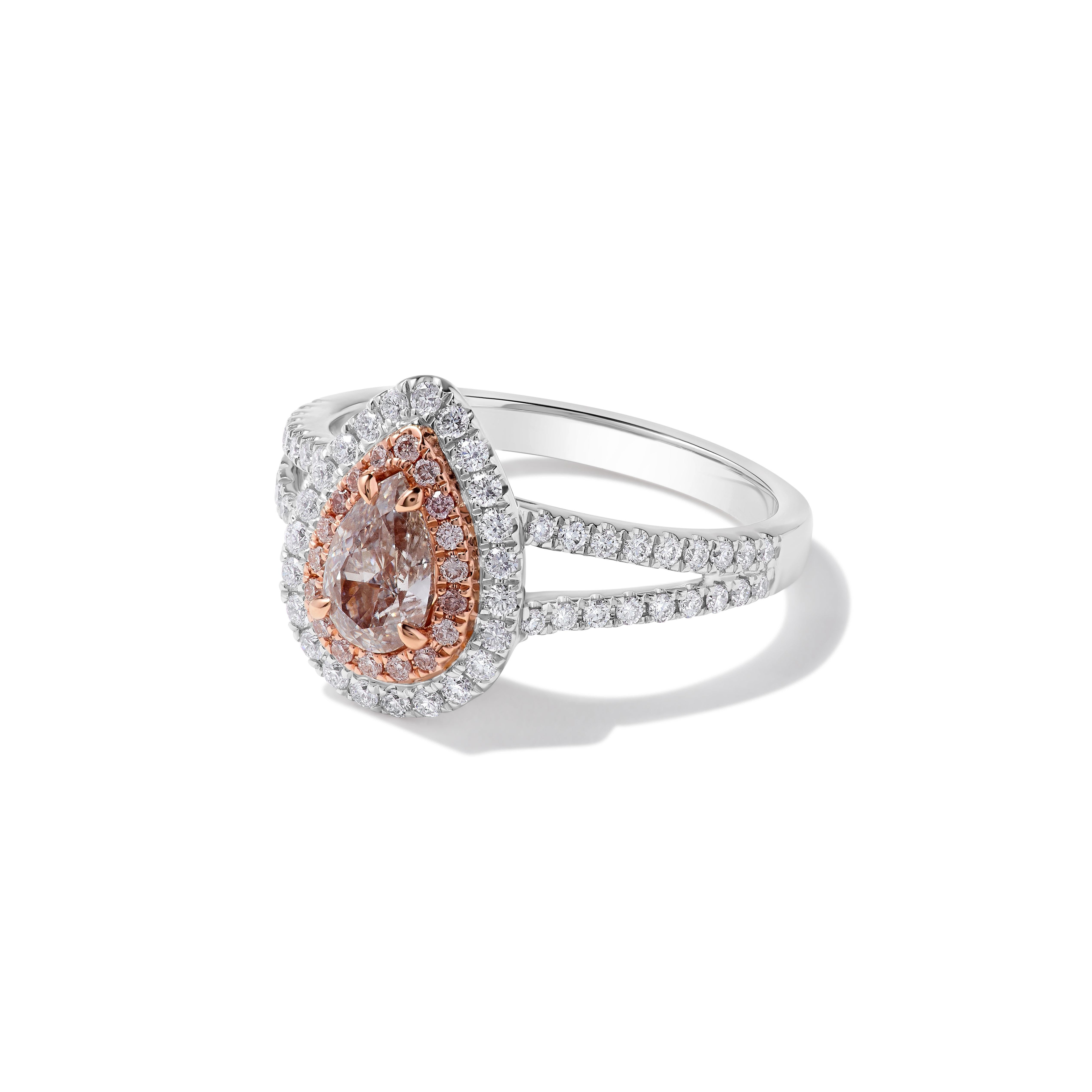 RareGemWorld's beautiful GIA certified diamond ring. Mounted in a beautiful 18K Rose and White Gold setting with a natural pear cut pink diamond as well as a natural round cut white diamond. These diamonds are surrounded by round natural pink
