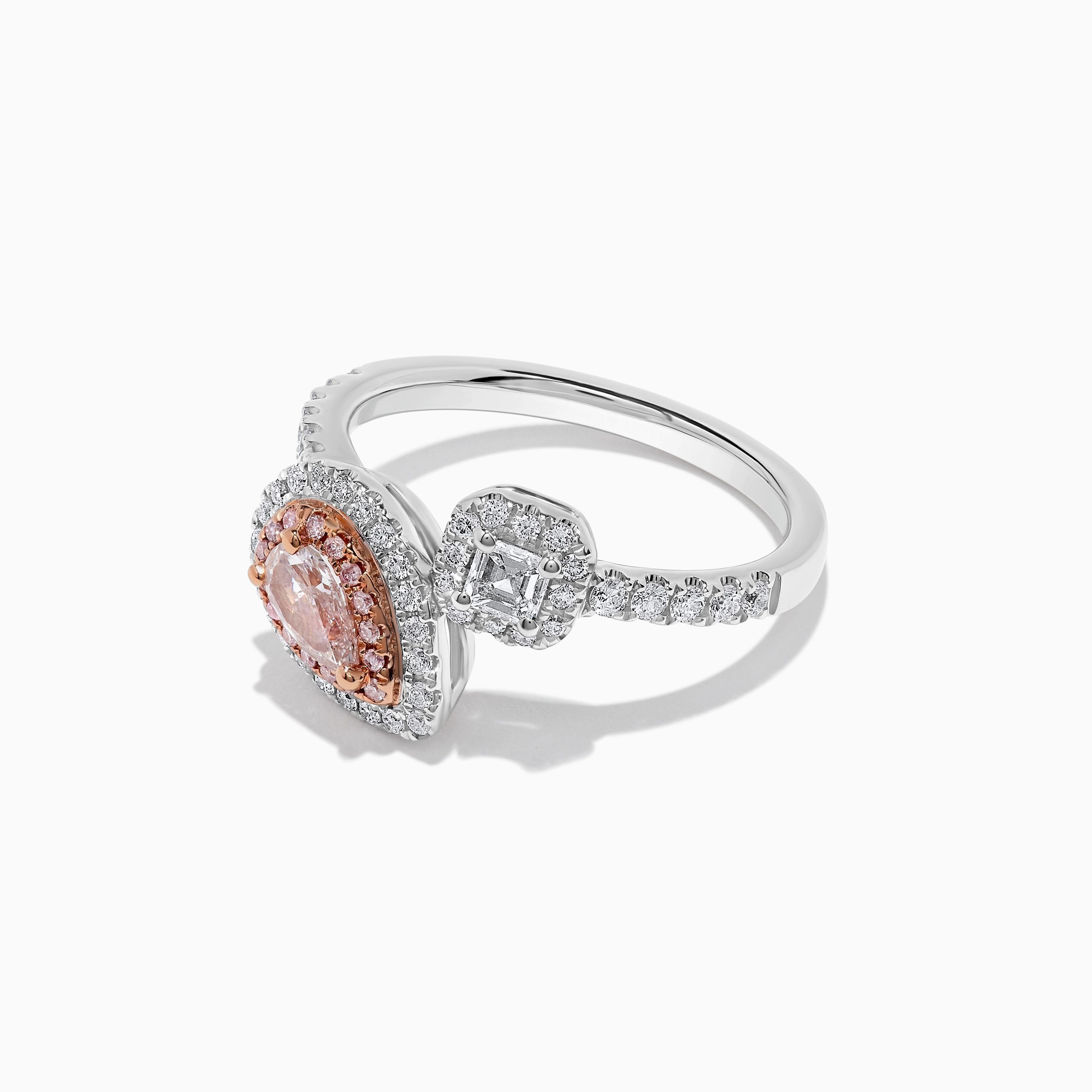 RareGemWorld's classic GIA certified diamond ring. Mounted in a beautiful 18K Rose and White Gold setting with a natural pear cut pink diamond. The pink diamond is surrounded by a natural emerald cut white diamond, round natural pink diamond melee,