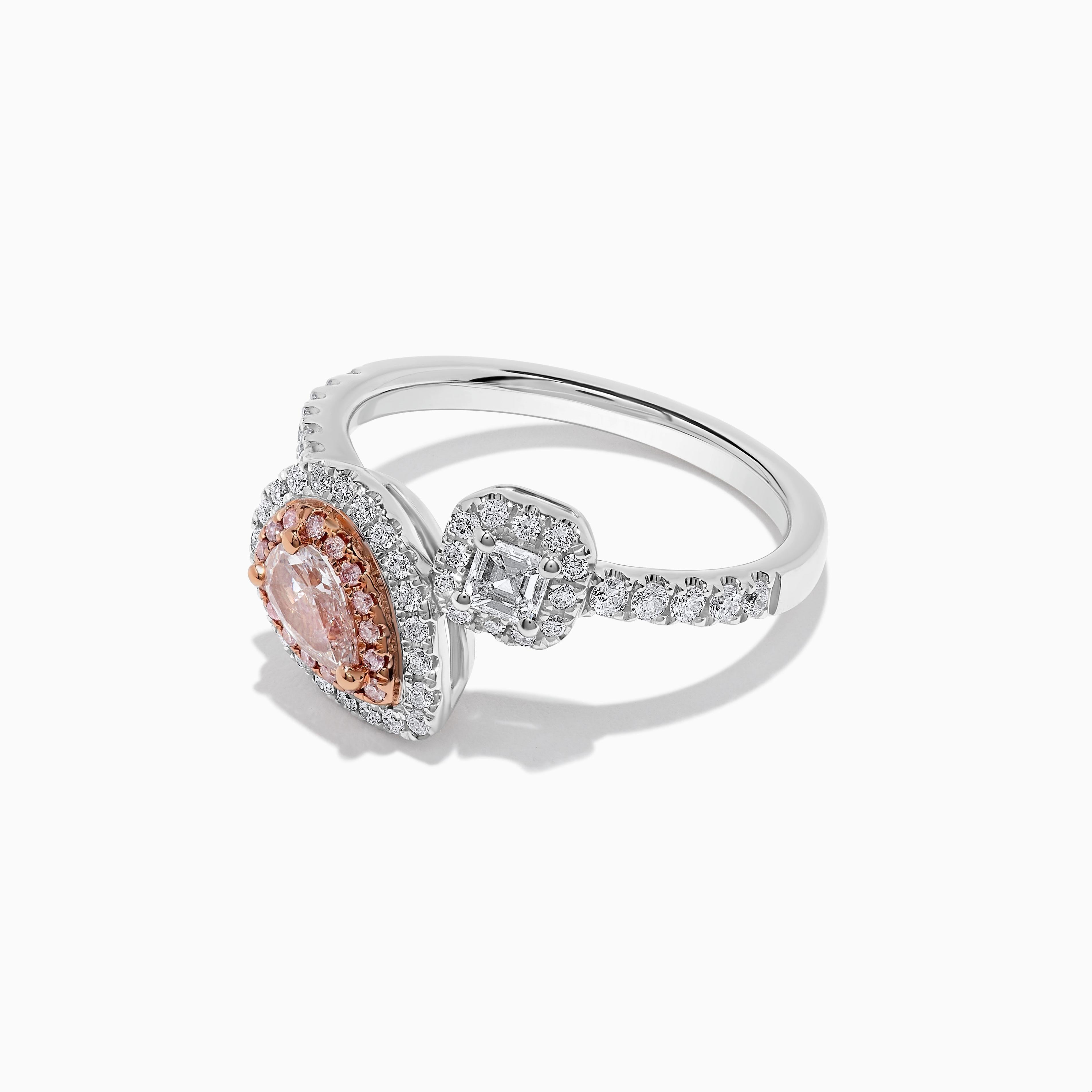 RareGemWorld's beautiful GIA certified diamond ring. Mounted in a beautiful 18K Rose and White Gold setting with a natural pear cut pink diamond. The pink diamond is surrounded by a natural emerald cut white diamond, round natural pink diamond