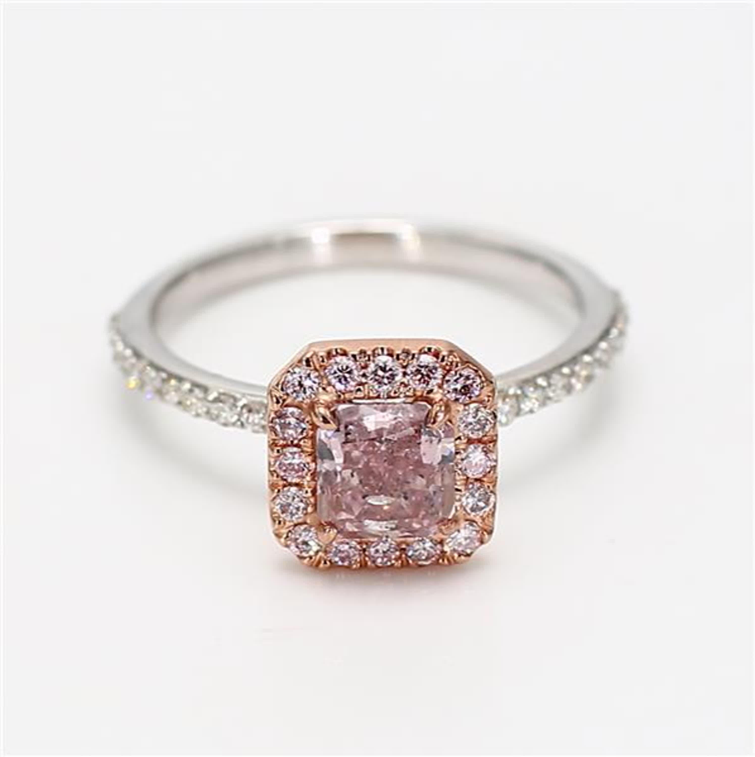 RareGemWorld's classic GIA certified diamond ring. Mounted in a beautiful 18K Rose and White Gold setting with a natural radiant cut pink diamond. The pink diamond is surrounded by round natural pink diamond melee and round natural white diamond