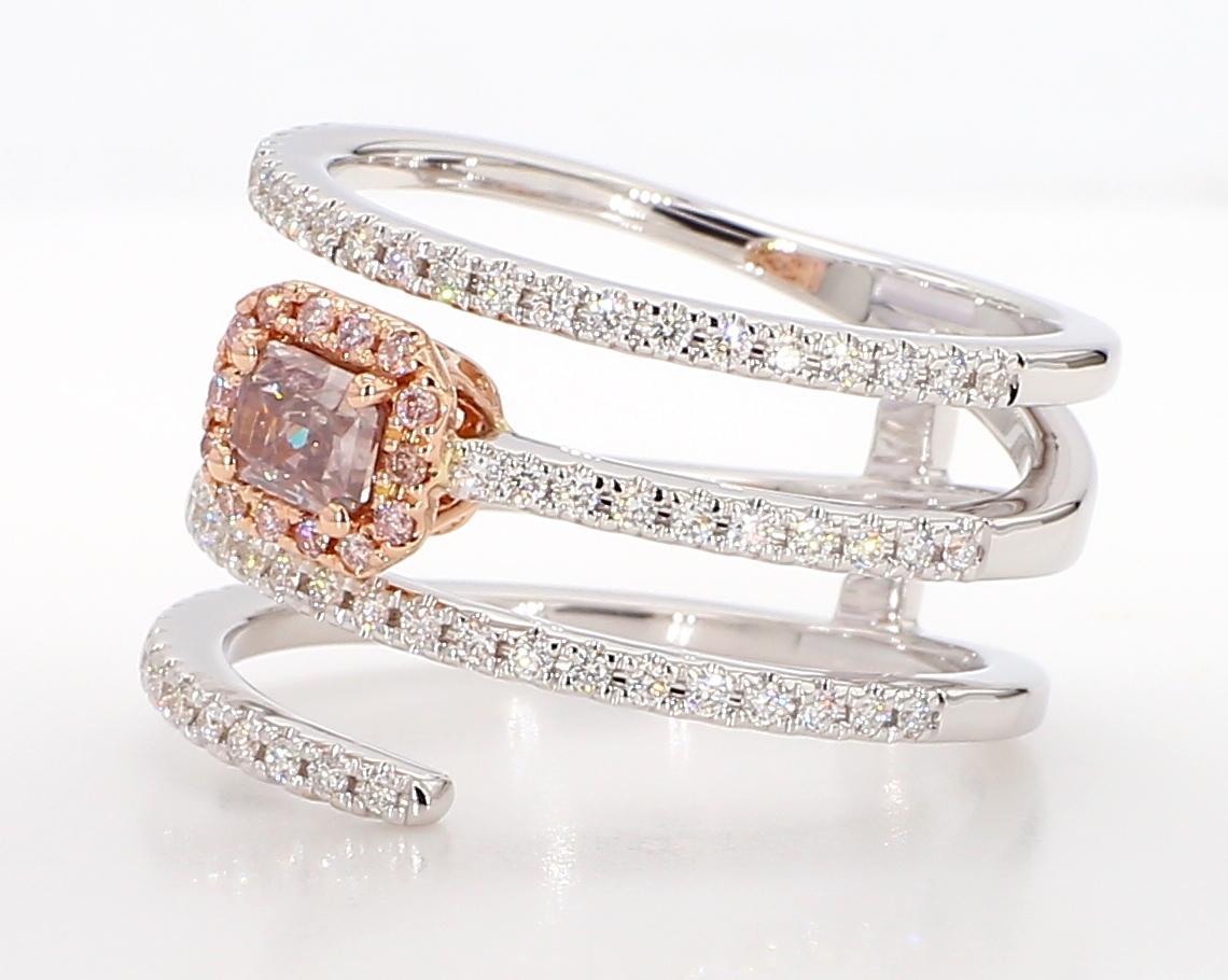 RareGemWorld's beautiful GIA certified diamond ring. Mounted in a beautiful 18K Rose and White Gold setting with a natural radiant cut pink diamond. The pink diamond is surrounded by round natural pink diamond melee and round natural white diamond