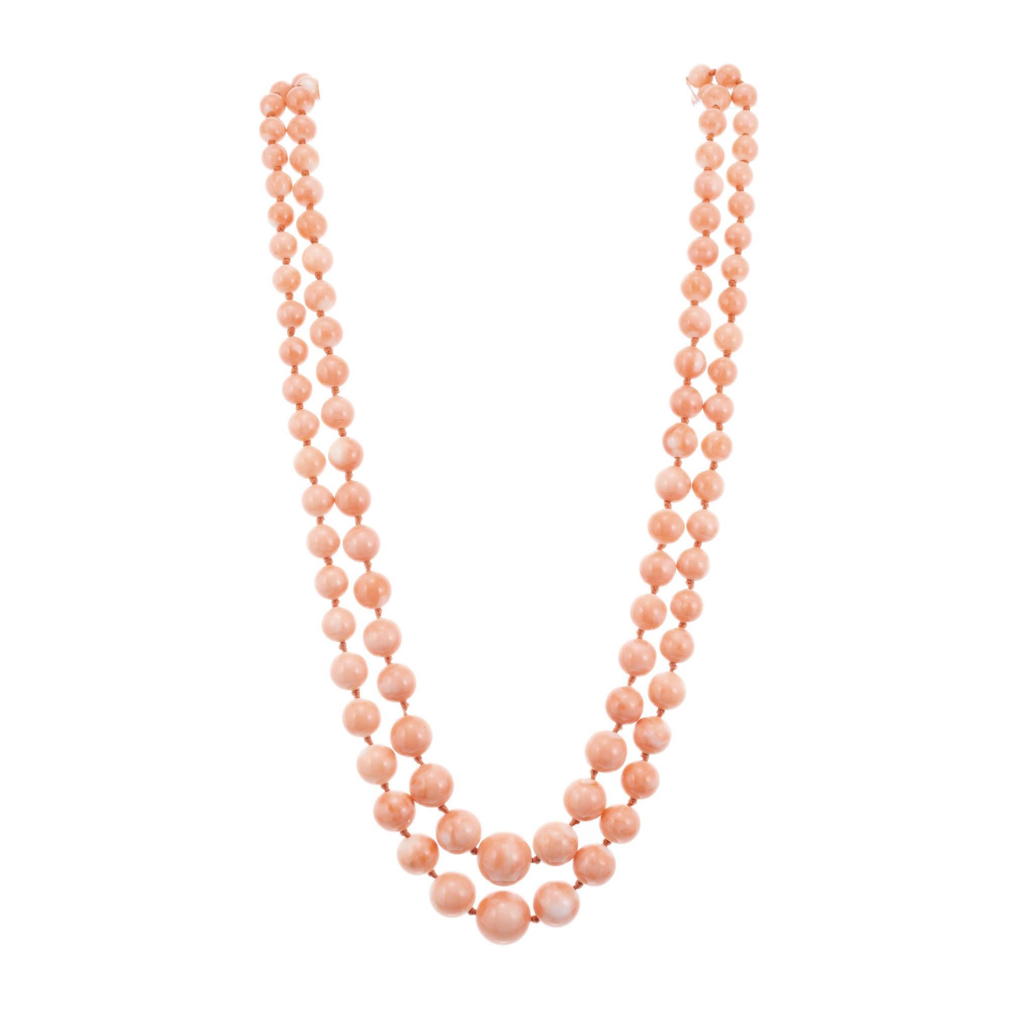 Natural untreated GIA certified salmon coral multi-strand graduated necklace. 14k yellow gold catch. Freshly strung. 22-24 inches. 

51 red mottled pinkish orange coral beads 7.7-13.4mm GIA Certificate # 6207874768
57 red mottled pinkish orang coral