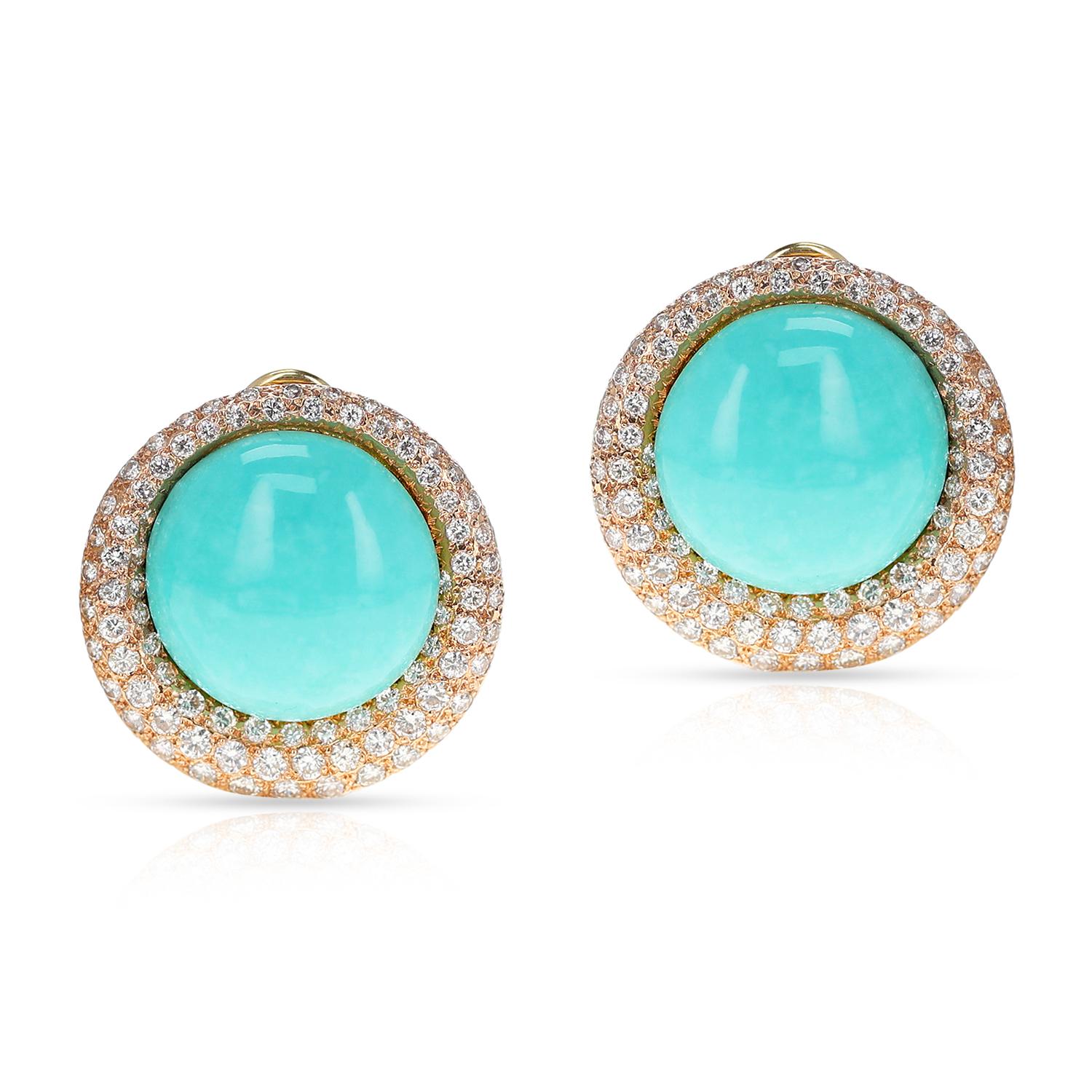 A pair of GIA Certified Natural Turquoise Earrings with Diamonds. The total weight of the earrings is 23.90 grams. The measurement is 20MM of the turquoise. The earrings are made in 14k yellow gold. The total diamond weight is appx. 4 carats. The