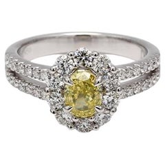 Bague en platine avec diamants jaunes ovales et blancs certifiés GIA de 1.62 carat poids total