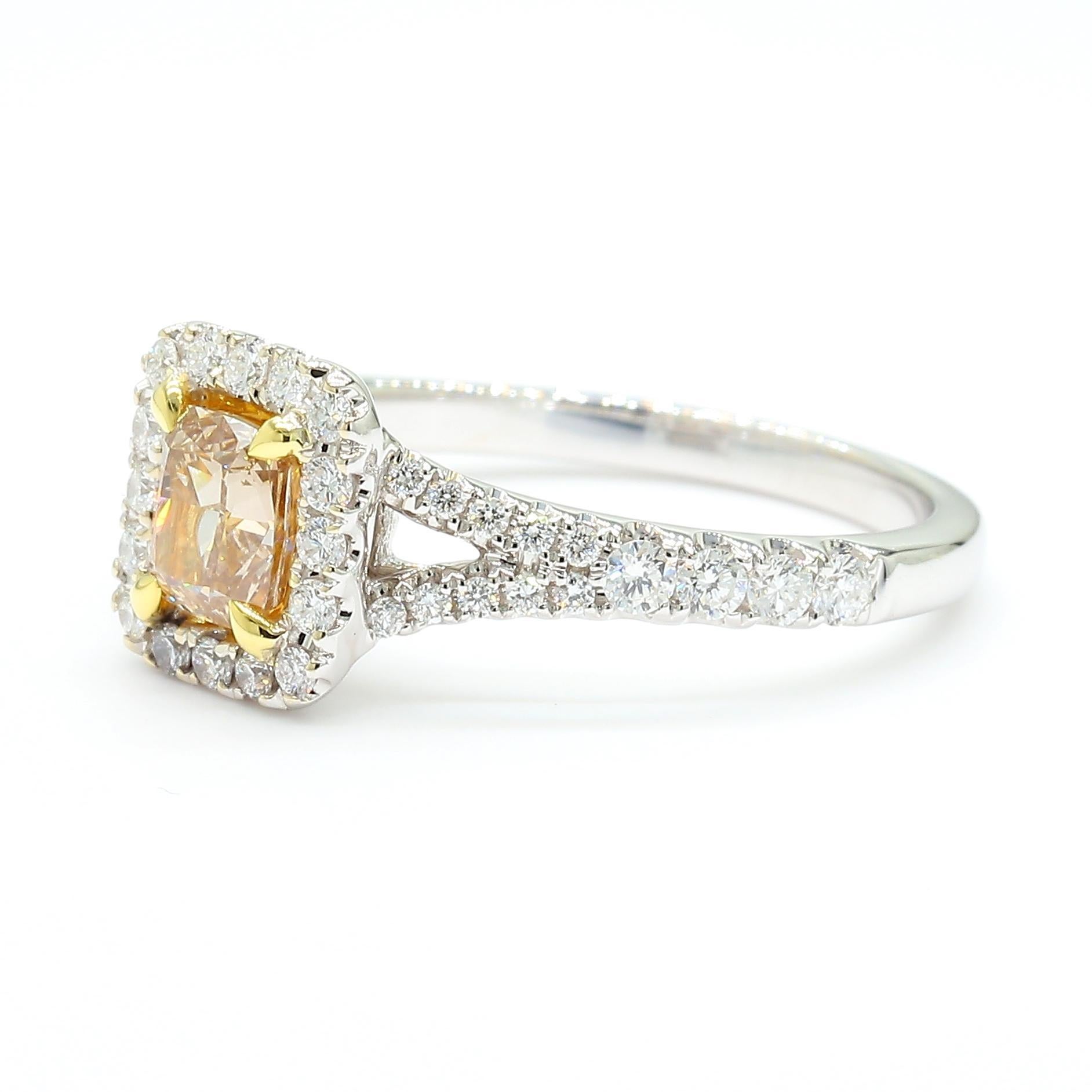 RareGemWorld's classic diamond ring. Mounted in a beautiful 18K Yellow and White Gold setting with a natural cushion cut brown diamond. The brown diamond is surrounded by round natural white diamond melee. This ring is guaranteed to impress and