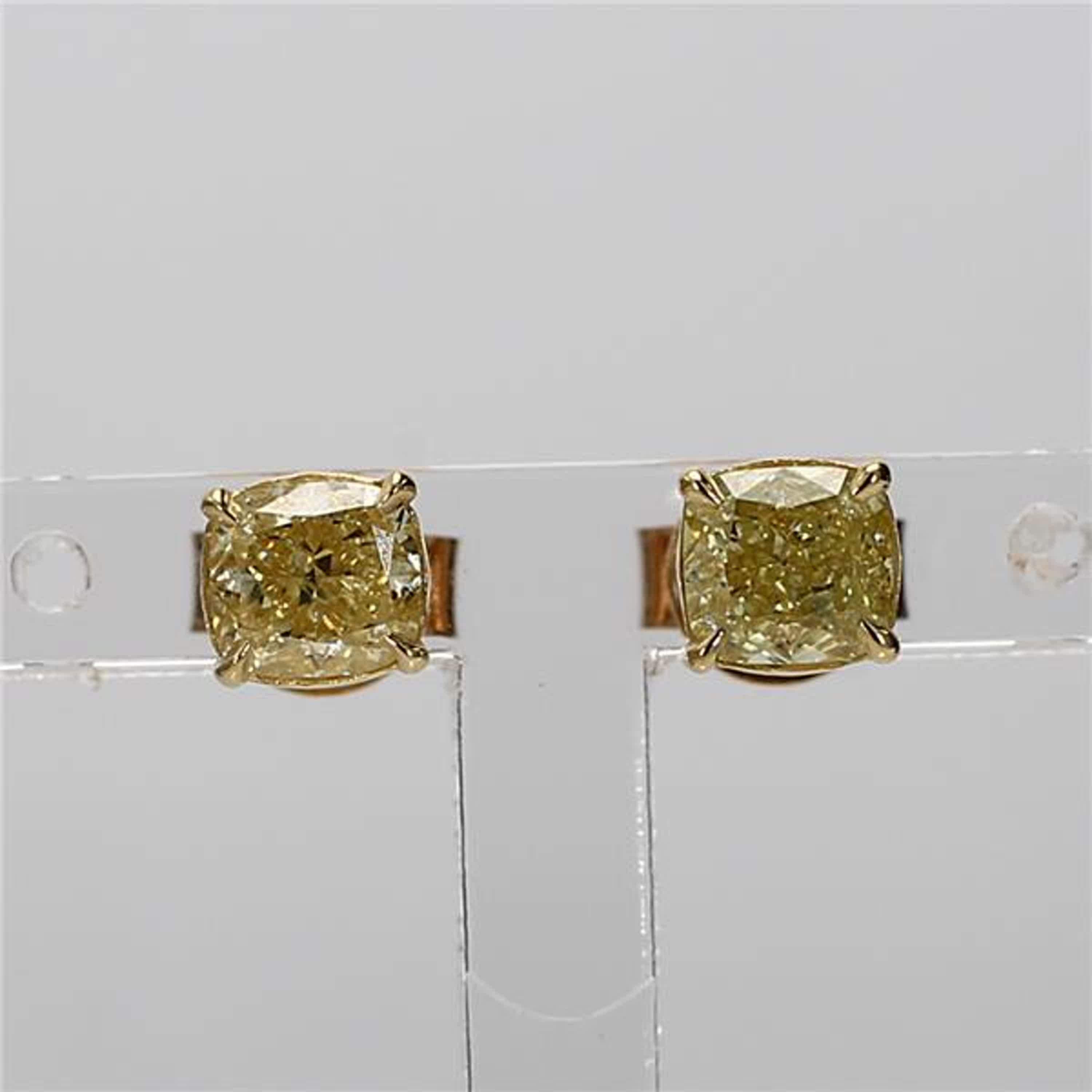 RareGemWorld's classic GIA certified diamond earrings. Mounted in a beautiful 14K Yellow Gold setting with natural cushion cut yellow diamonds. These earrings are guaranteed to impress and enhance your personal collection!

Total Weight: