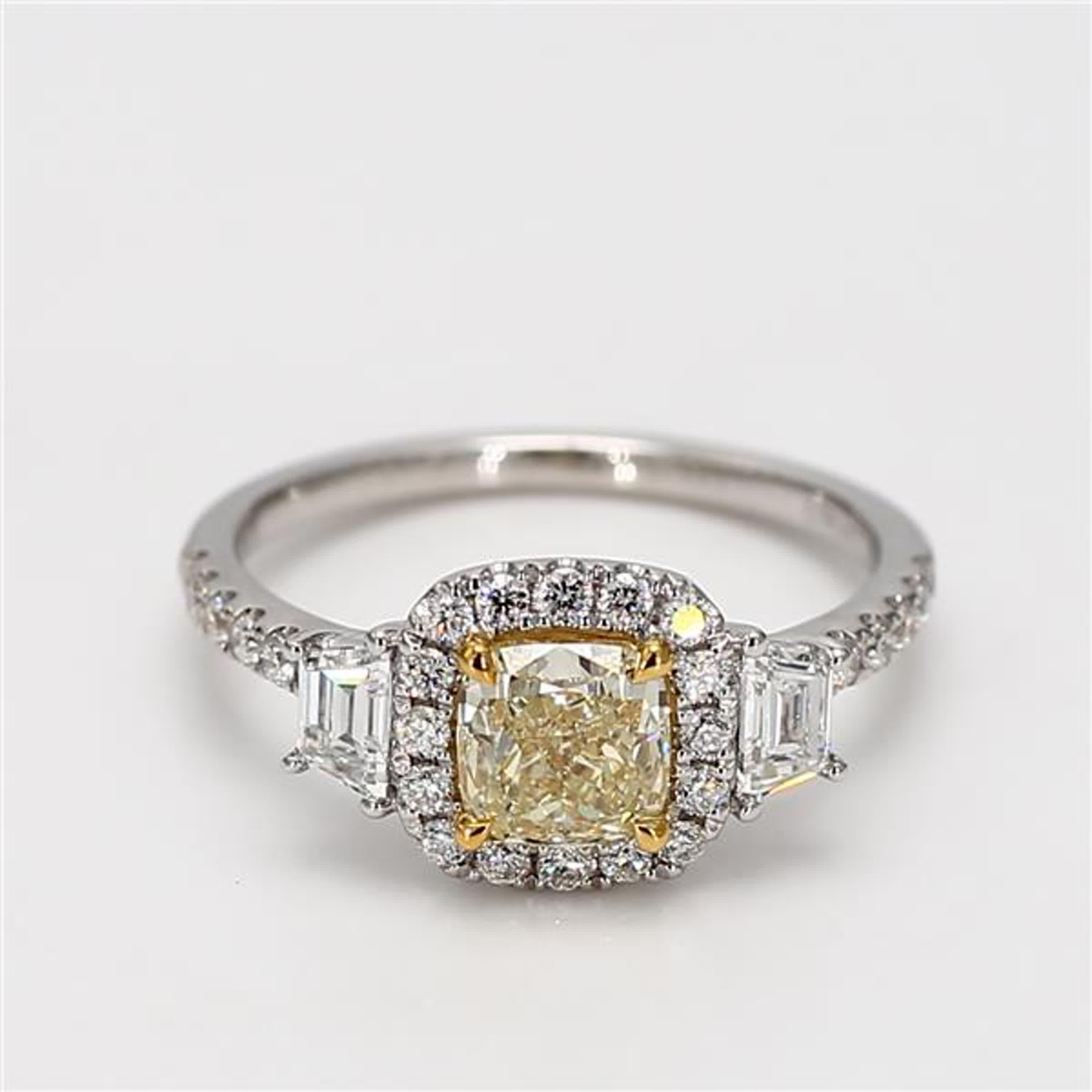 RareGemWorld's classic GIA certified diamond ring. Mounted in a beautiful 18K Yellow and White Gold setting with a natural cushion cut yellow diamond. The yellow diamond is surrounded by natural taper baguette white diamonds and round natural white