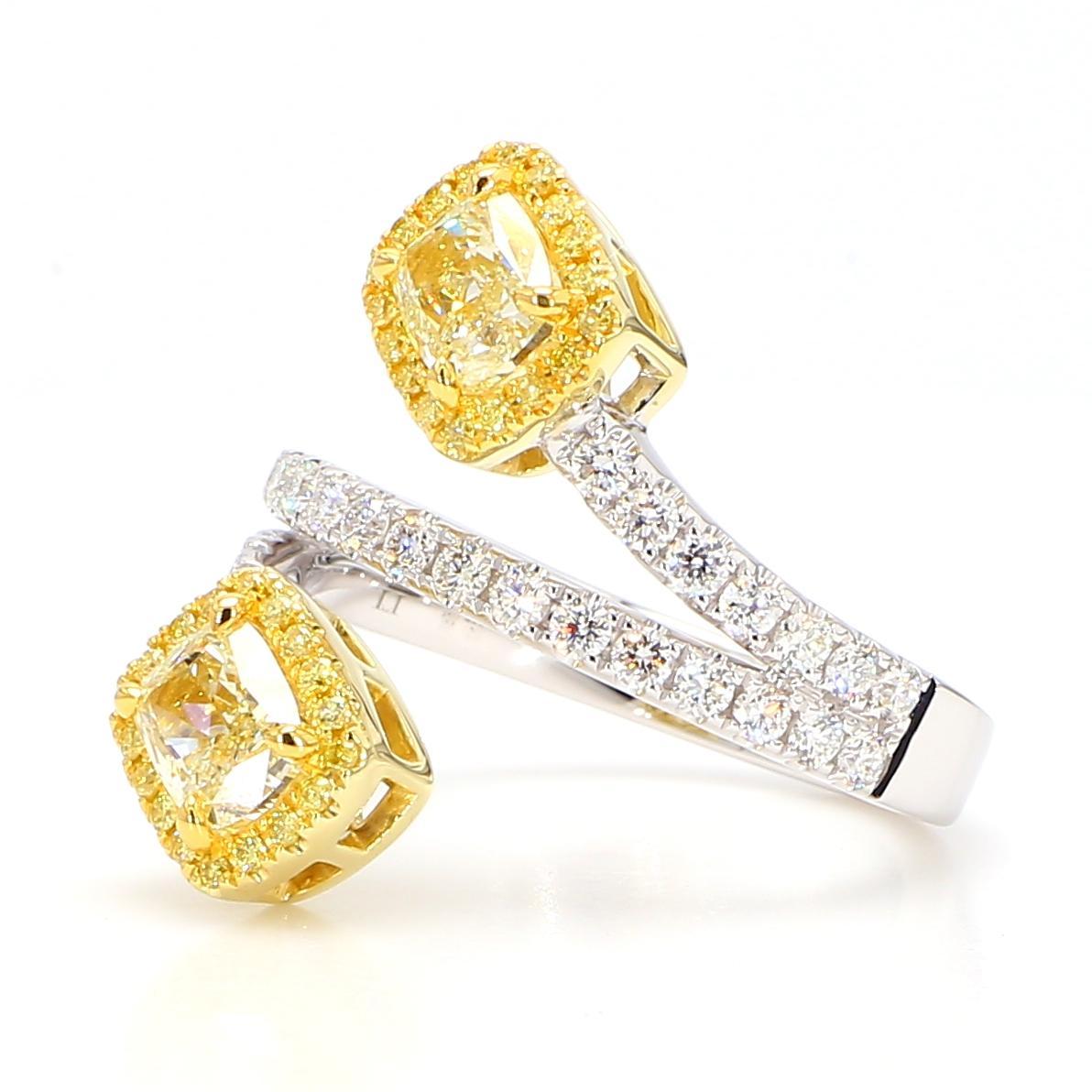 RareGemWorld's beautiful GIA certified diamond ring. Mounted in a beautiful 18K Yellow and White Gold setting with natural cushion cut yellow diamonds. The yellow diamonds are surrounded by round natural yellow diamond melee and round natural white
